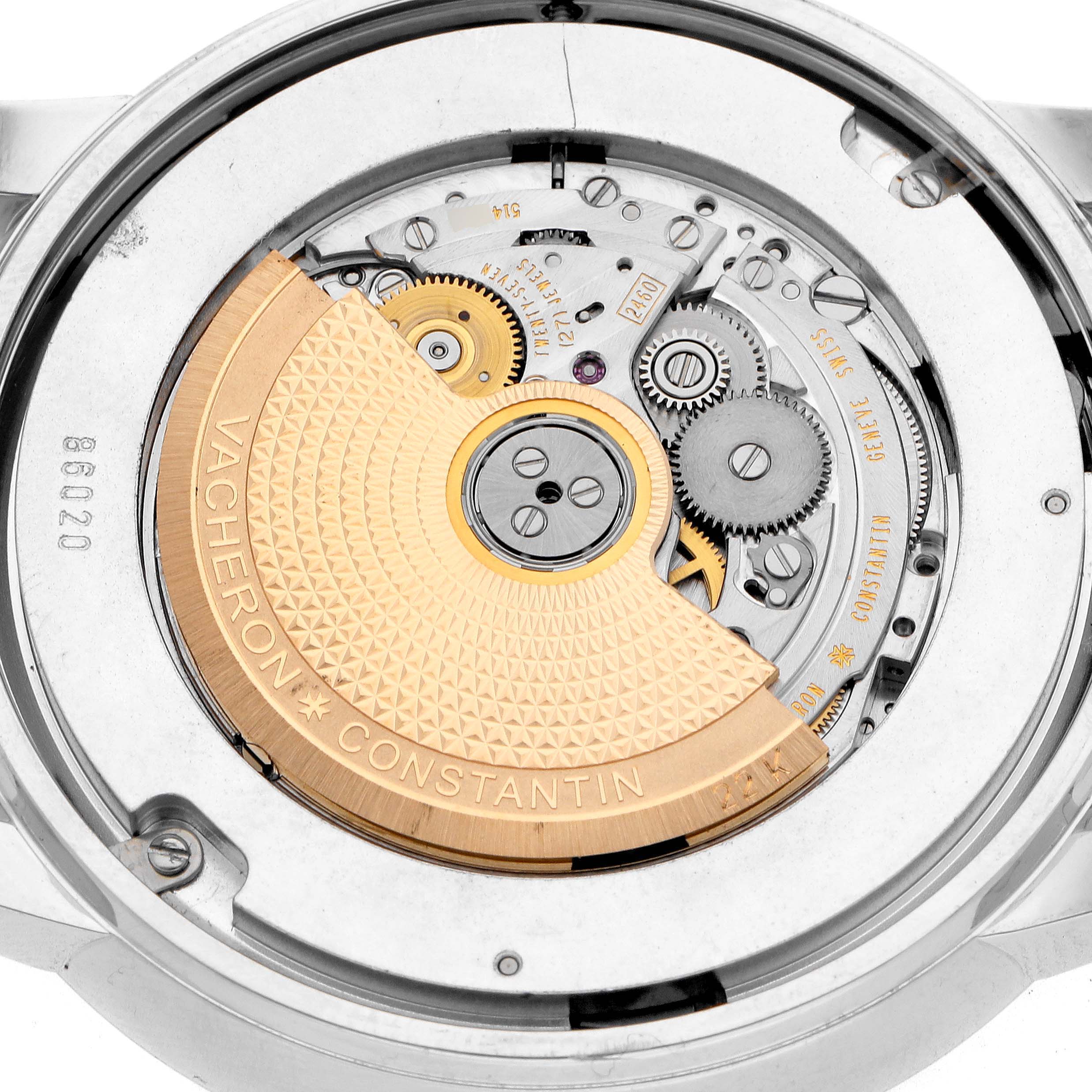 The image shows the back view of the Patrimony model by Vacheron Constantin, highlighting its intricate movement and rotor.