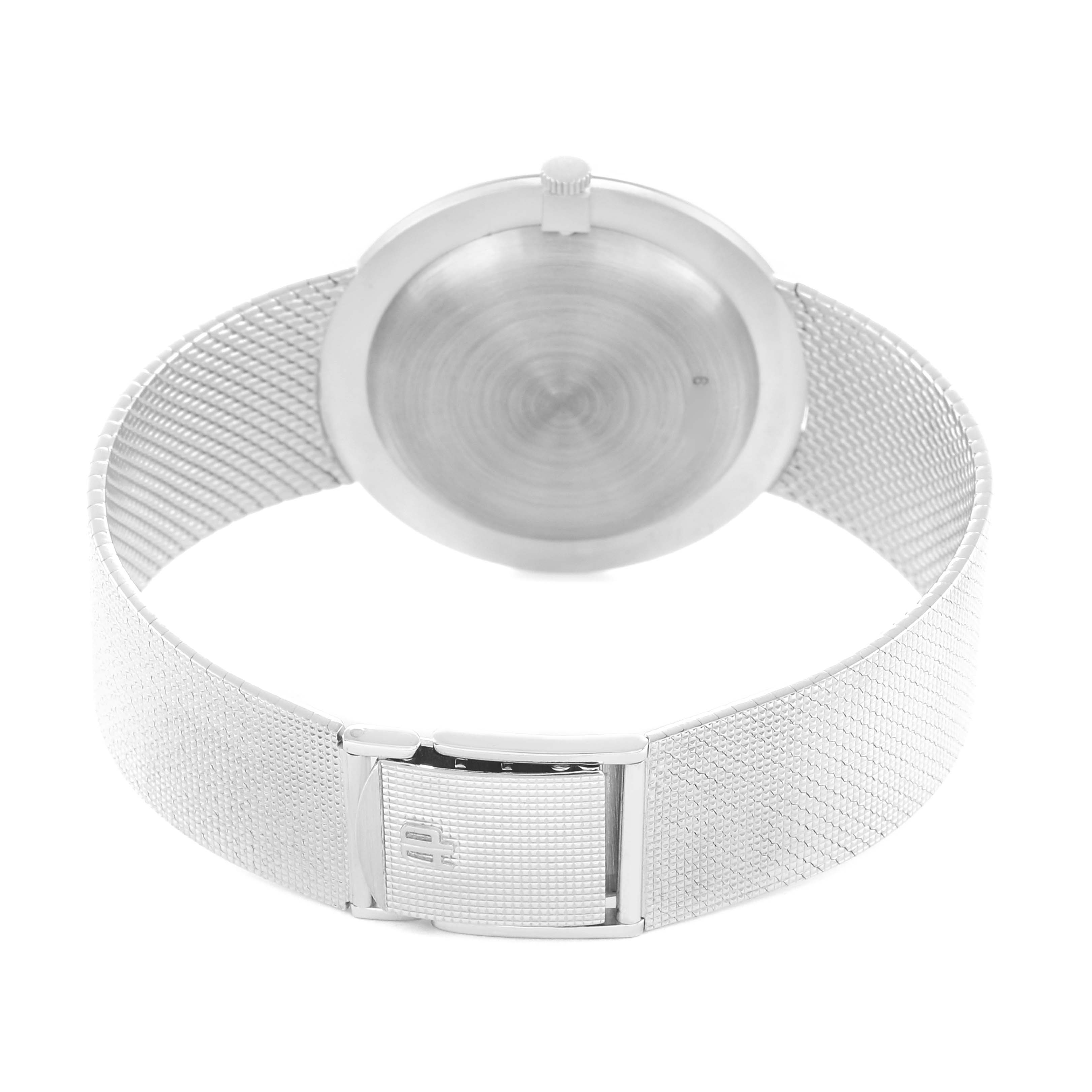 The image shows the back of the Vintage Audemars Piguet watch, highlighting its bracelet, clasp, and case back.