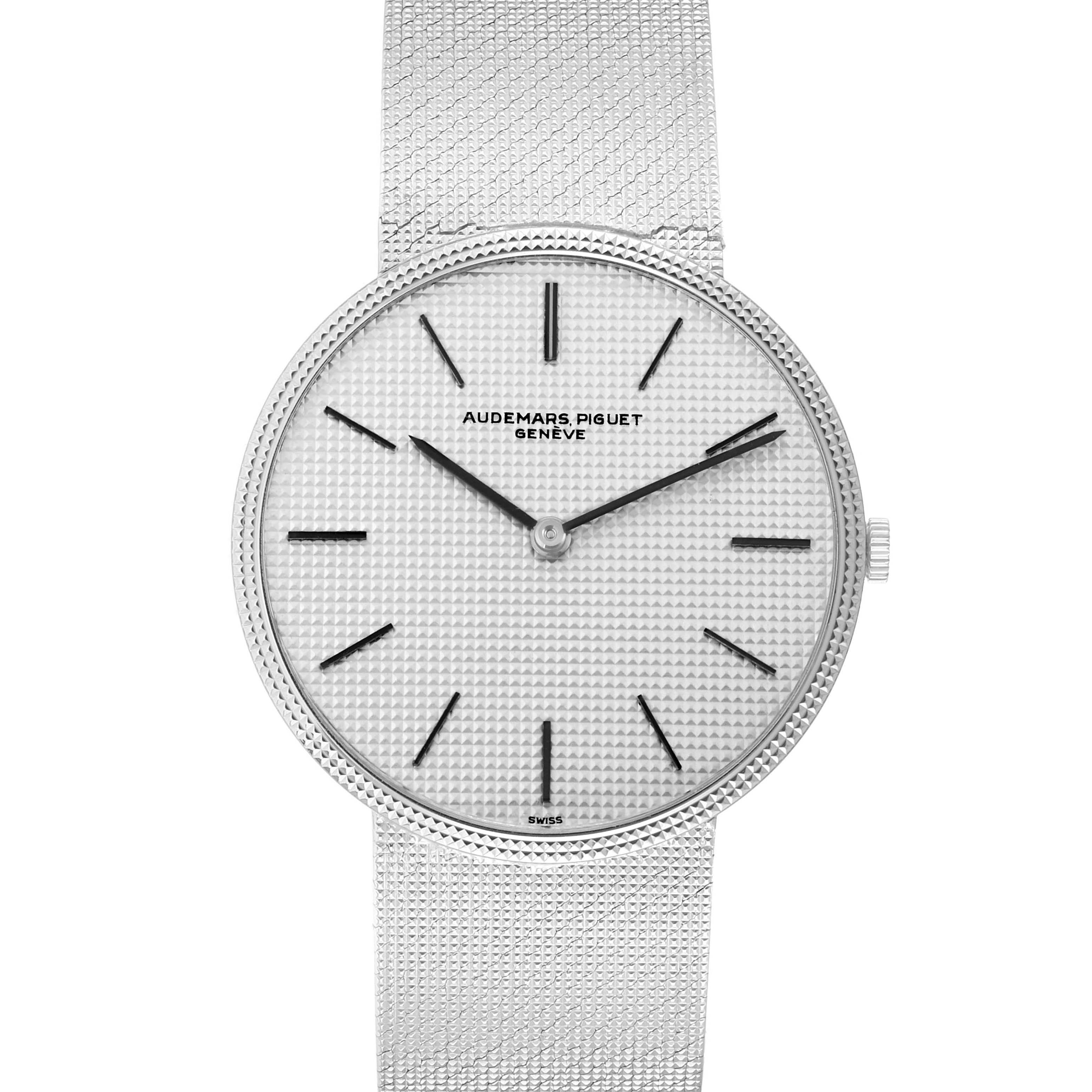 The image shows a front view of the Audemars Piguet Vintage Men
s White Gold Silver Dial watch, highlighting its textured dial and mesh bracelet.