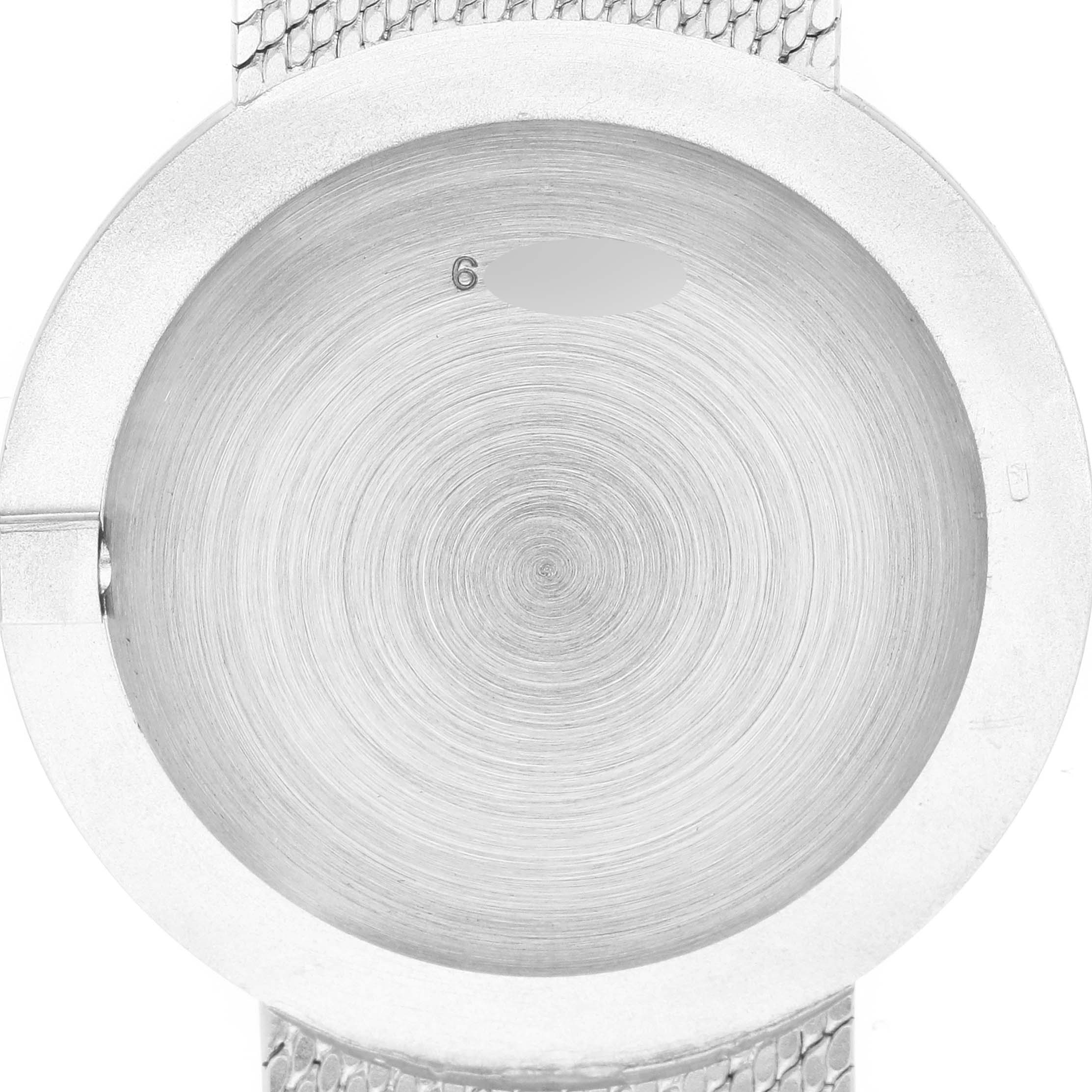 The image shows the back of a Vintage Audemars Piguet watch, highlighting the case and part of the metal bracelet.