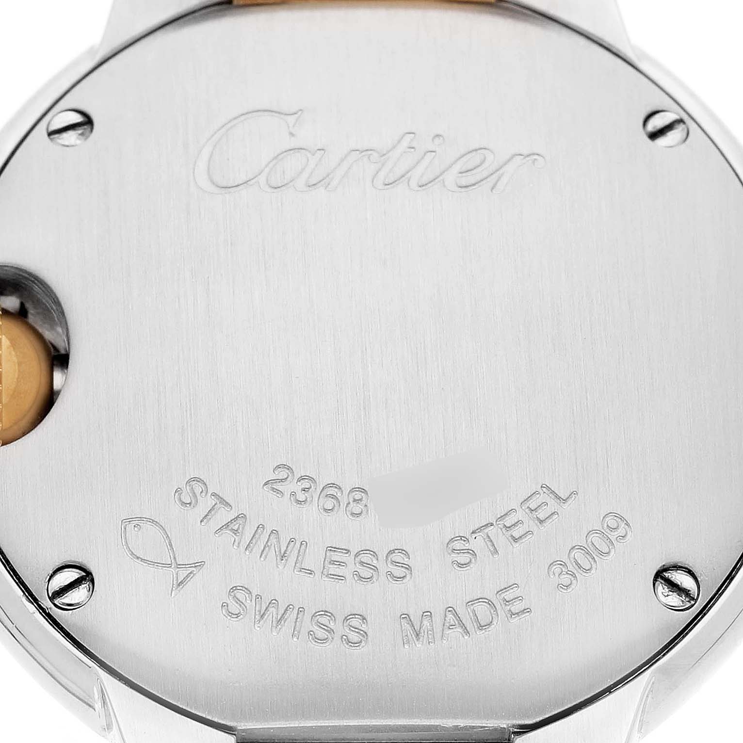The image shows the back of the Cartier Ballon Bleu W69007Z3 Women's Stainless Steel Silver Dial watch, highlighting engravings and screws.