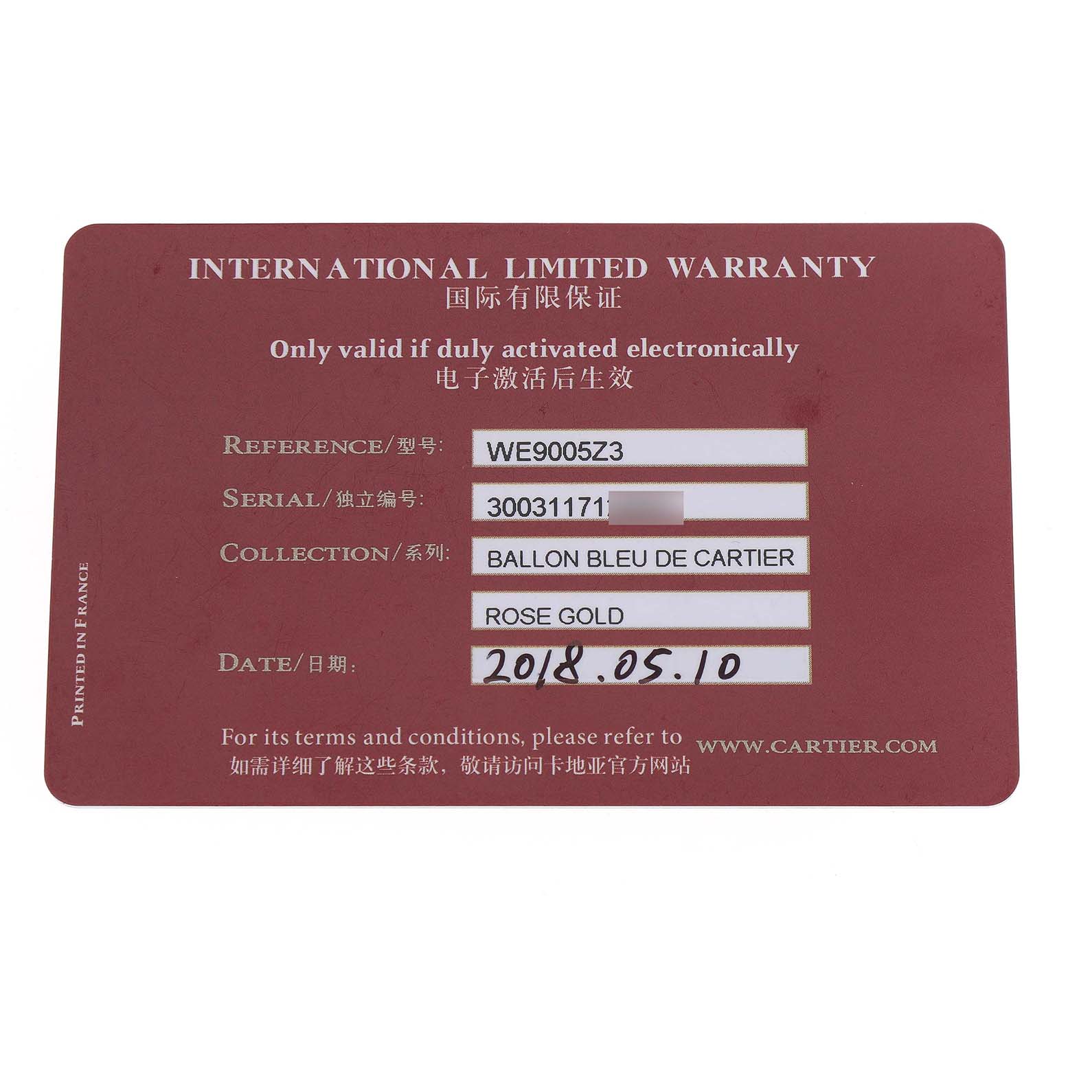 The image shows the international limited warranty card for the Ballon Bleu de Cartier watch.