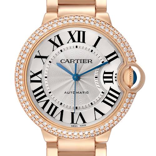The Cartier Ballon Bleu WE9005Z3 Women's Rose Gold Silver Dial watch is shown face-on, highlighting the diamond bezel, Roman numerals, and blue hands.