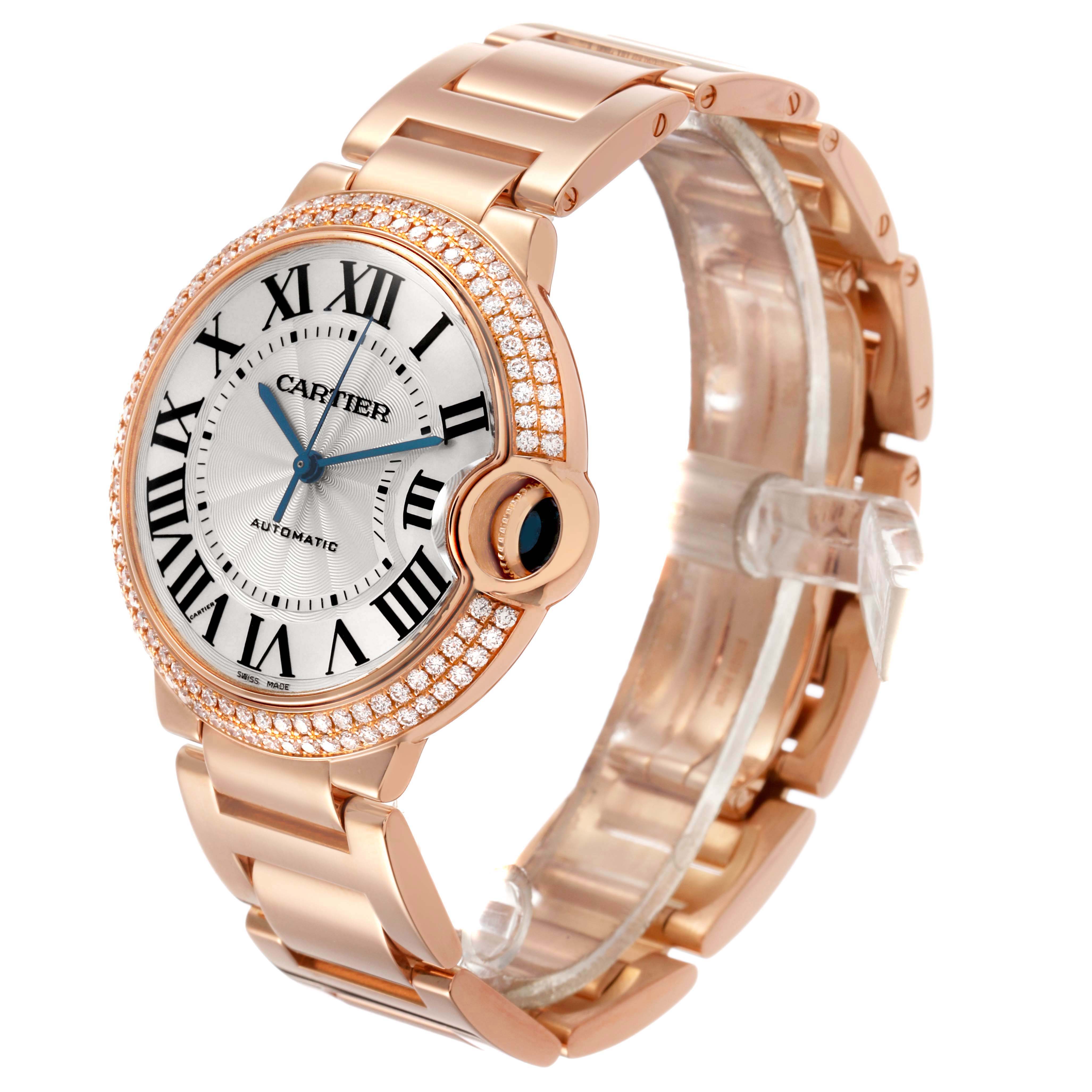 The Cartier Ballon Bleu WE9005Z3 Women's Rose Gold Silver Dial watch is shown at a side angle, highlighting its round face, Roman numerals, and rose gold bracelet.