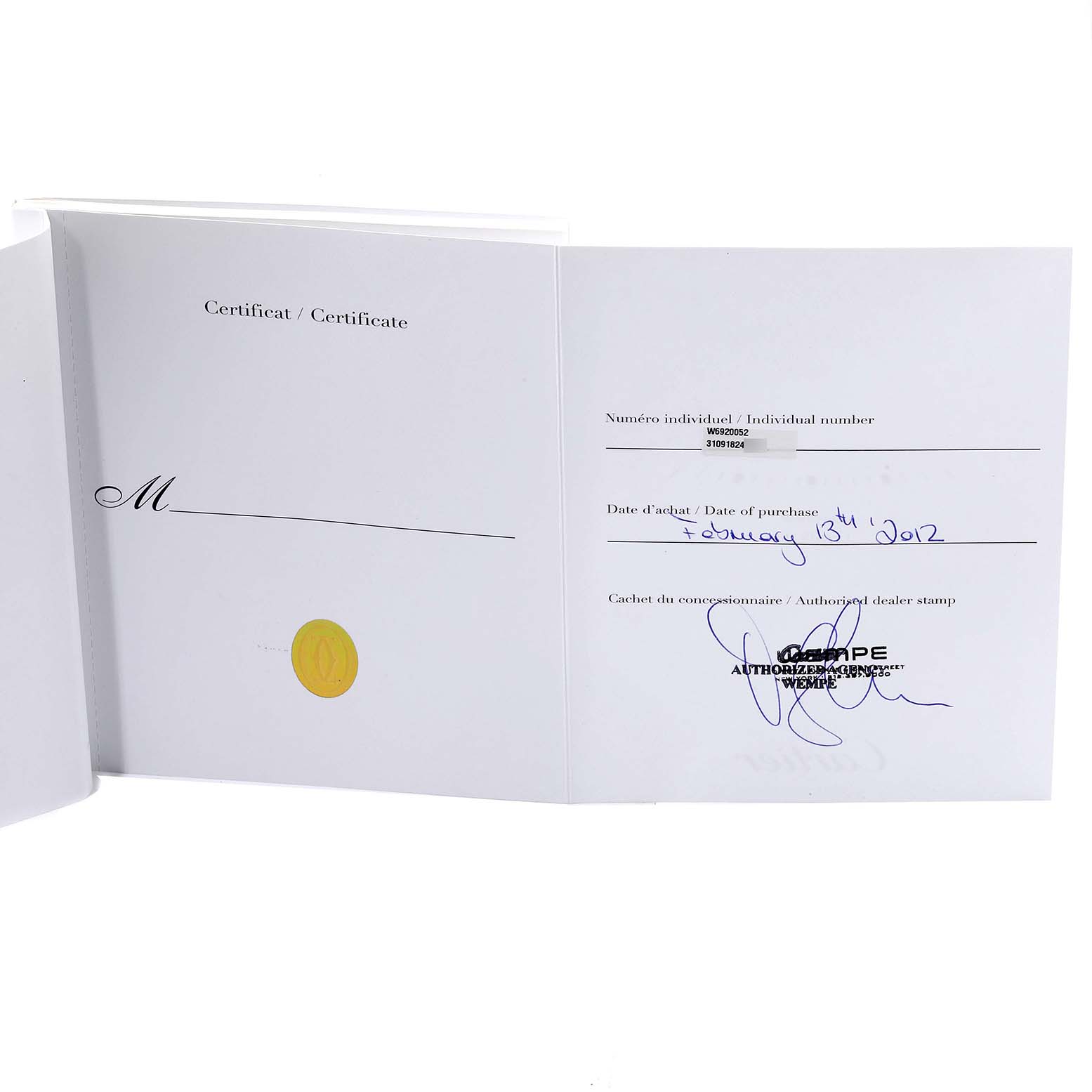 This image shows the opened certificate for the Ballon Bleu model by Cartier, displaying purchase details and an authorized dealer stamp.