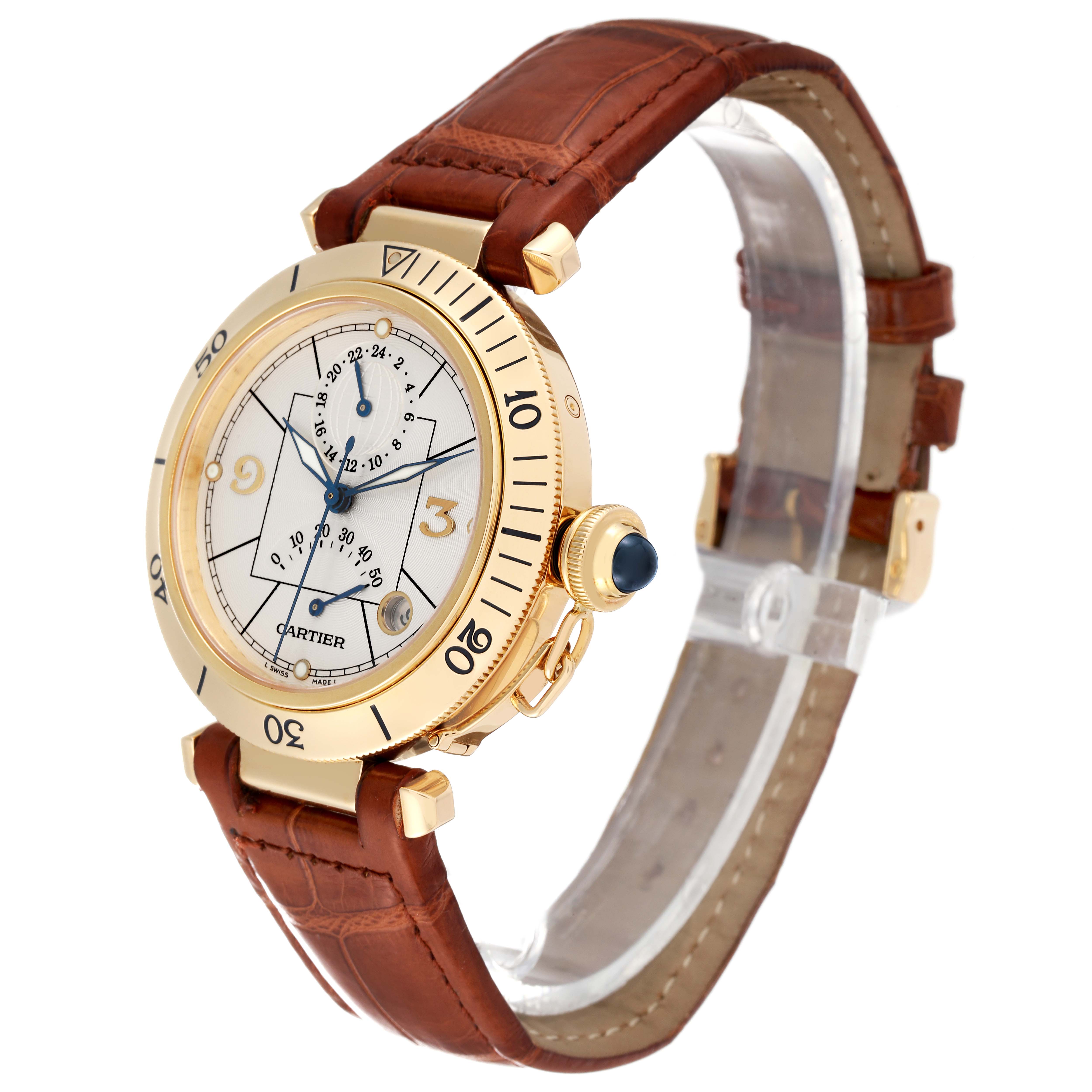 The image shows a Cartier Pasha W30144D1 Men's Yellow Gold Silver Dial W30144D1 Men's Yellow Gold Silver Dial watch at an oblique angle, highlighting its face, bezel, crown, and leather strap.