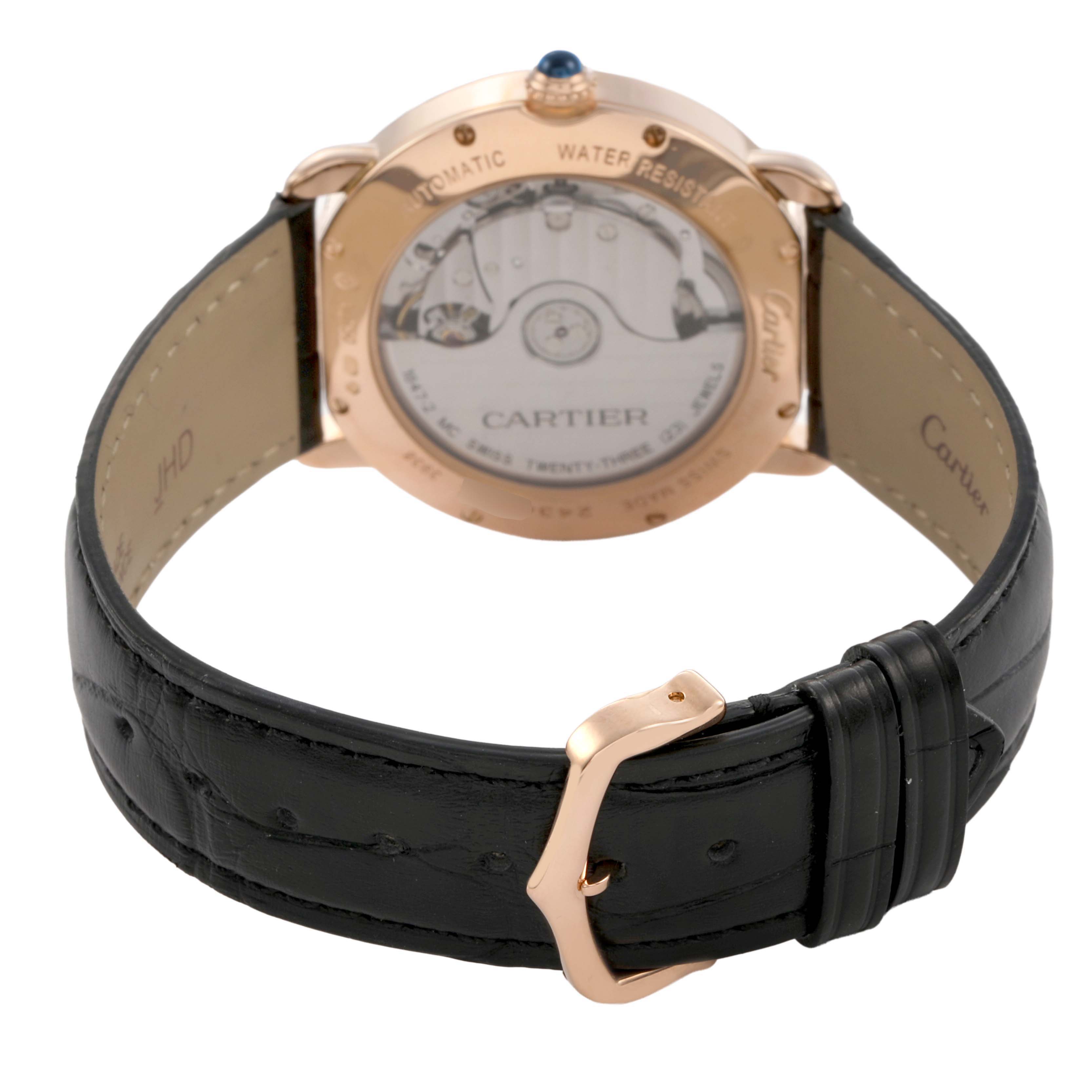 The image shows the back of the Cartier Ronde WGRN0006 Men's Rose Gold Silver Dial watch, highlighting its automatic movement and leather strap.