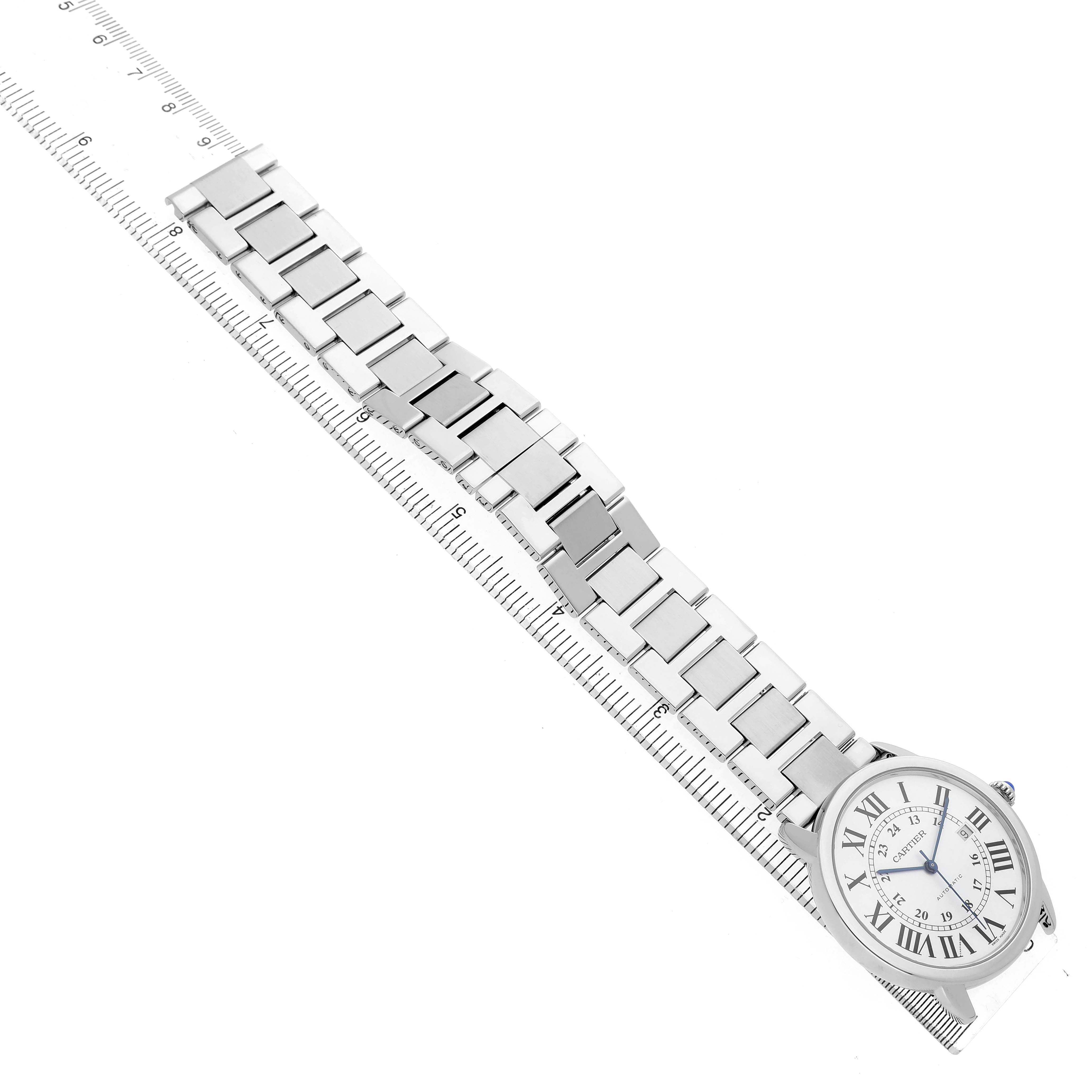 The Cartier Ronde W6701011 Men's Stainless Steel Silver Dial watch is shown at a top-down angle, displaying its metal bracelet and round face with Roman numerals.