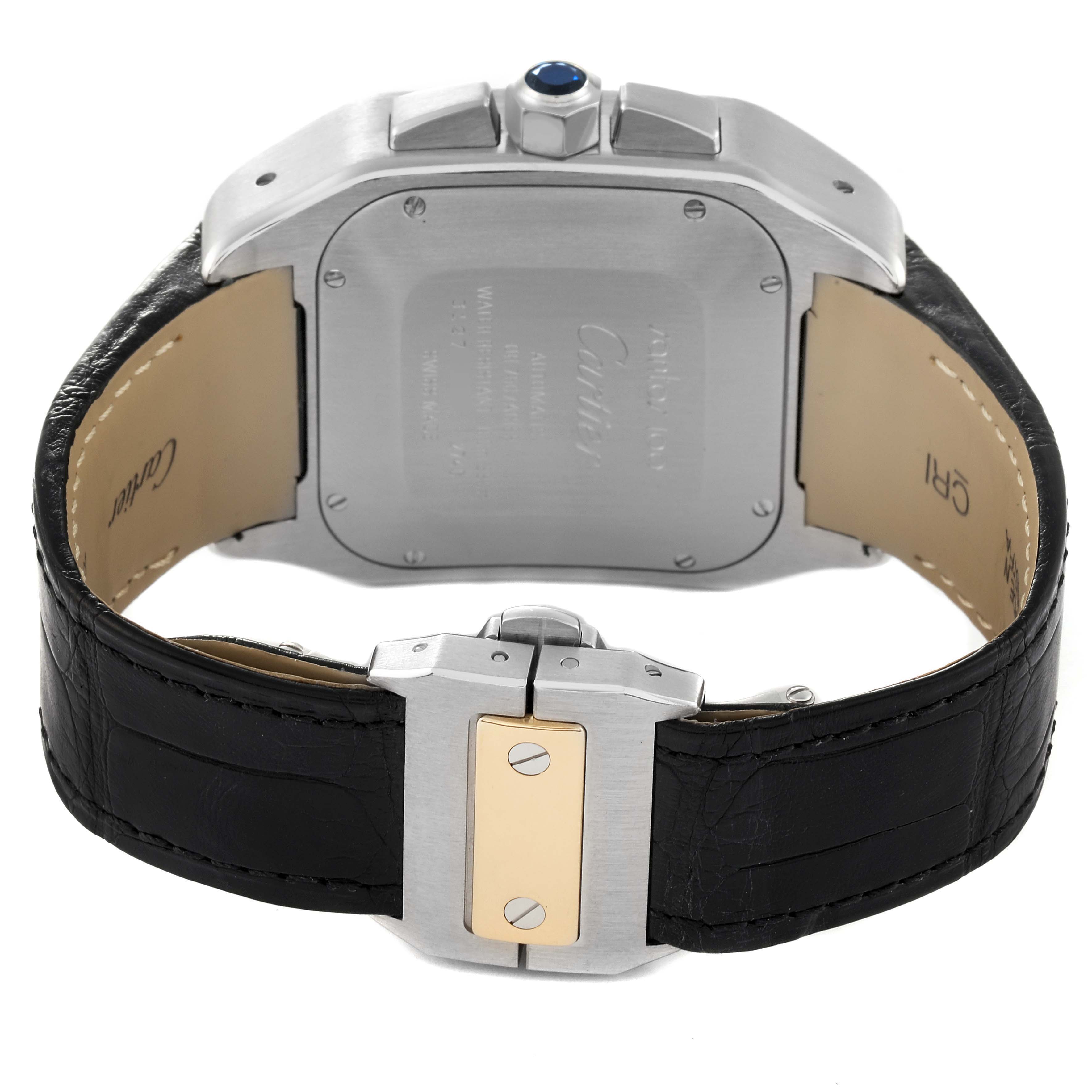 The image shows the backside of the watch case and the leather strap with the clasp of a Santos model by Cartier.