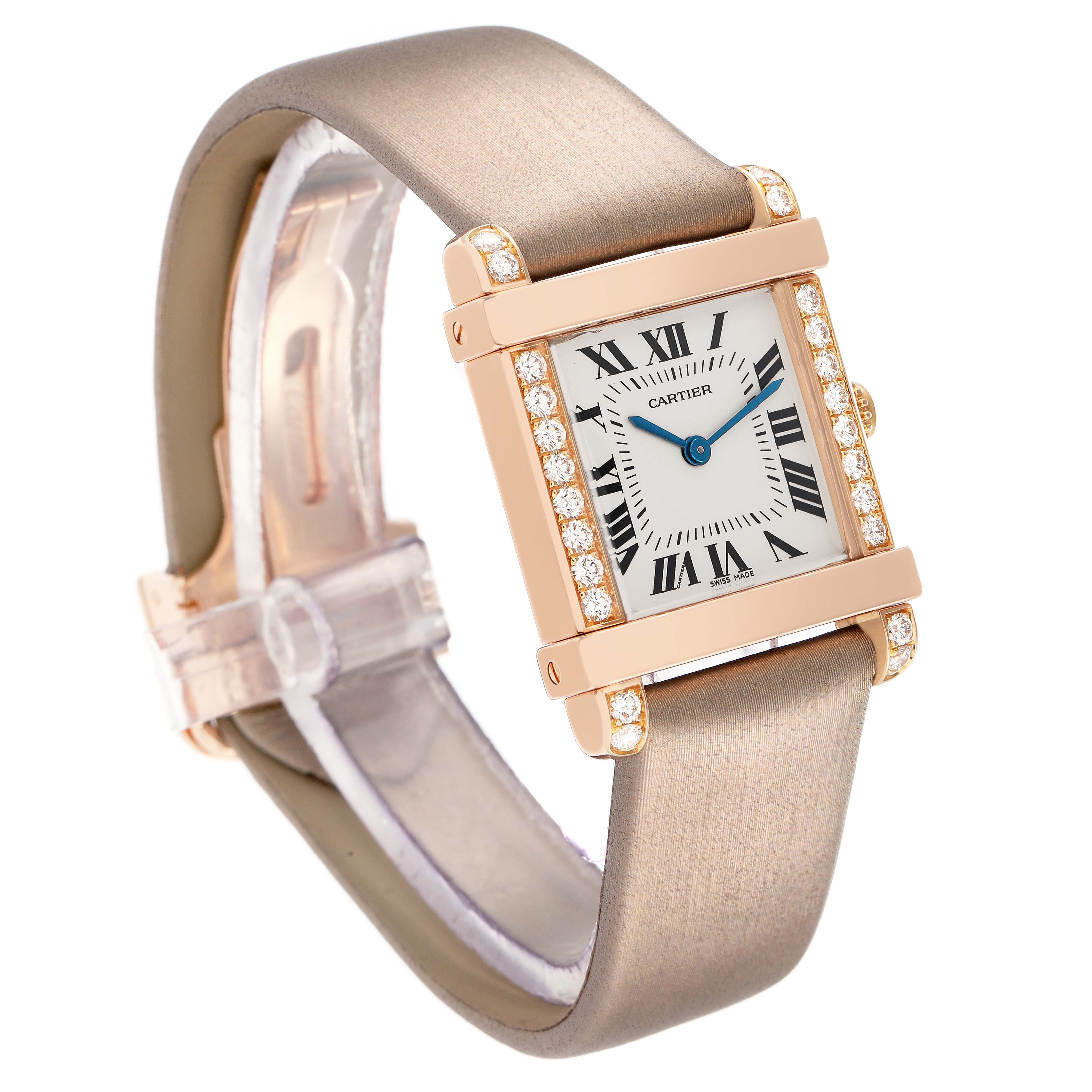 The Cartier Tank Louis WE300131 Women
s Rose Gold Silver Dial watch is shown from a three-quarter angle, highlighting the rectangular case, diamond accents, and strap.