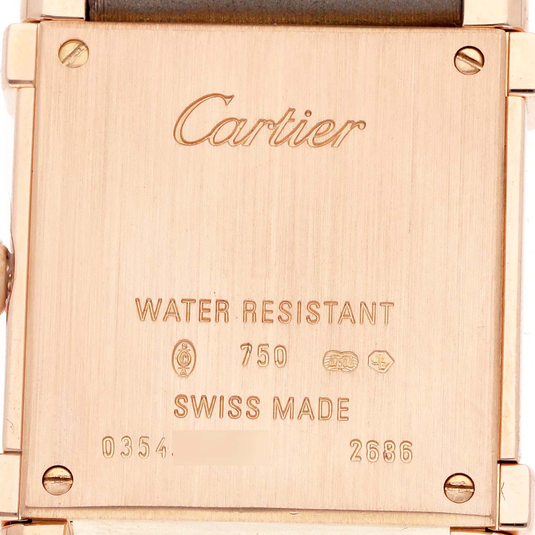 The image shows the back of the Cartier Tank Louis WE300131 Women
s Rose Gold Silver Dial watch, highlighting its engravings and brand inscriptions.