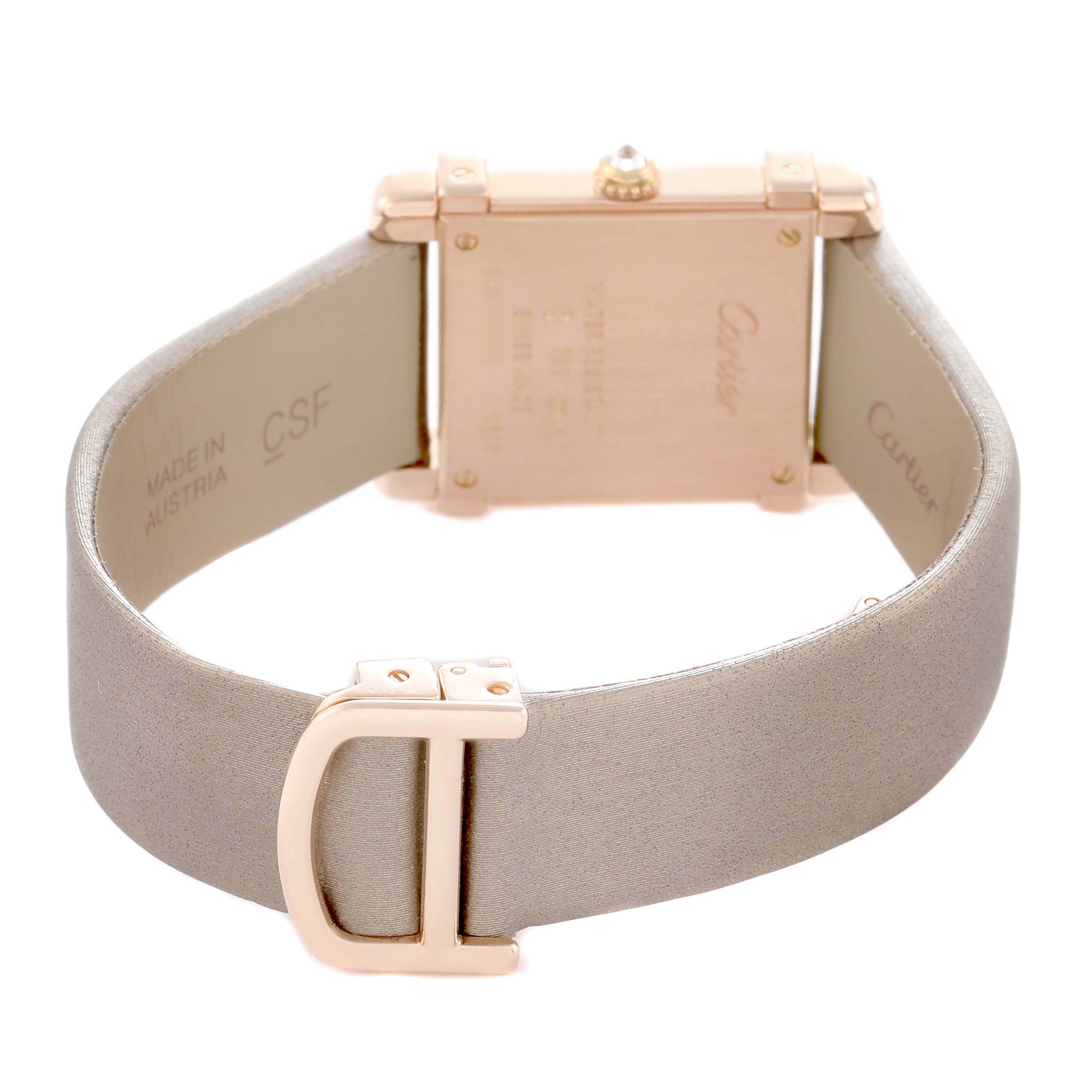 The image shows the back of a Cartier Tank Louis WE300131 Women
s Rose Gold Silver Dial watch, highlighting its case back, strap, and buckle.