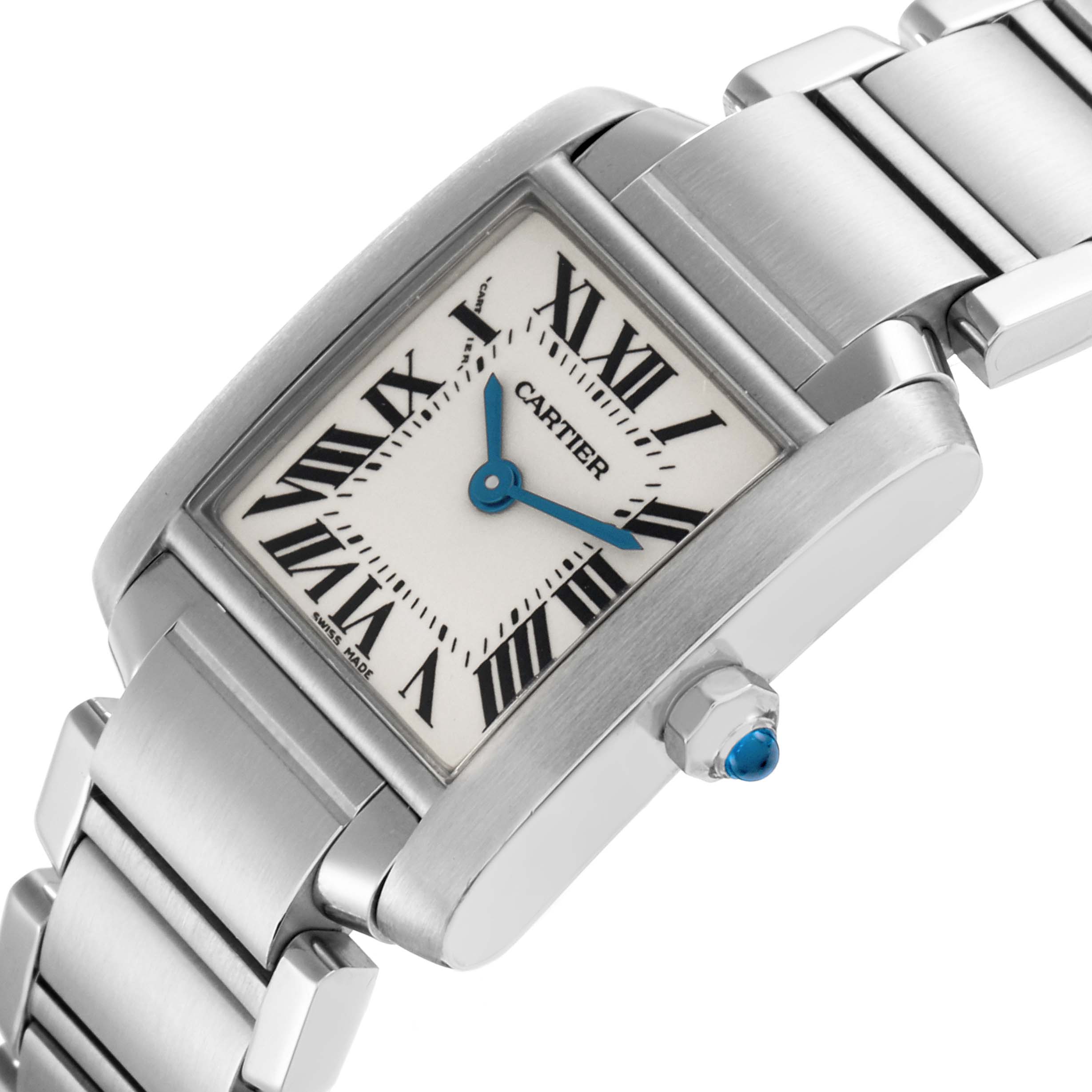 The Cartier Tank Francaise W51008Q3 Women
s Stainless Steel Silver Dial watch is shown at an angled view, displaying the face with Roman numerals, blue hands, and part of the metal bracelet.