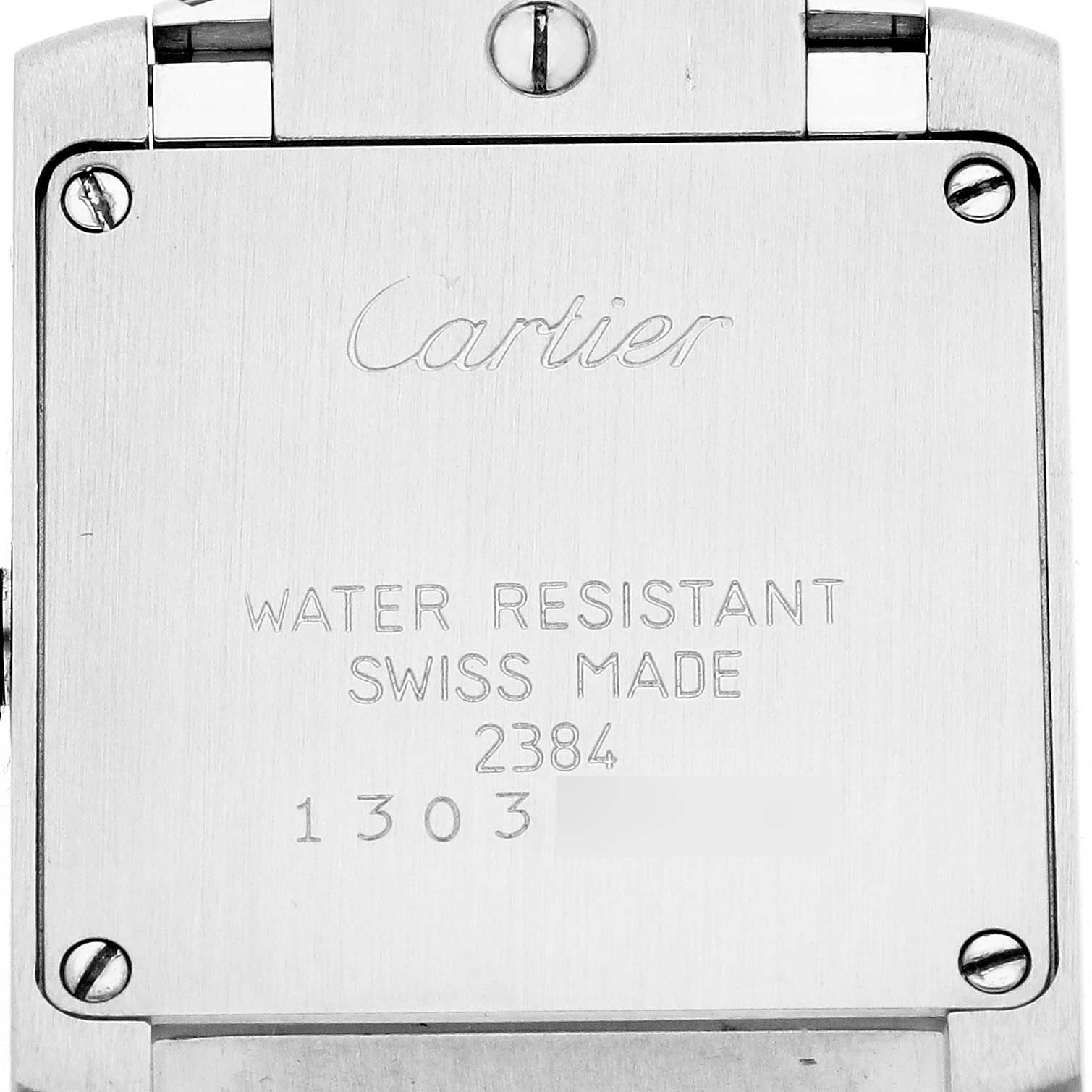 The image shows the case back of a Cartier Tank Francaise W51008Q3 Women
s Stainless Steel Silver Dial watch, featuring the brand
s engraving and specifications.