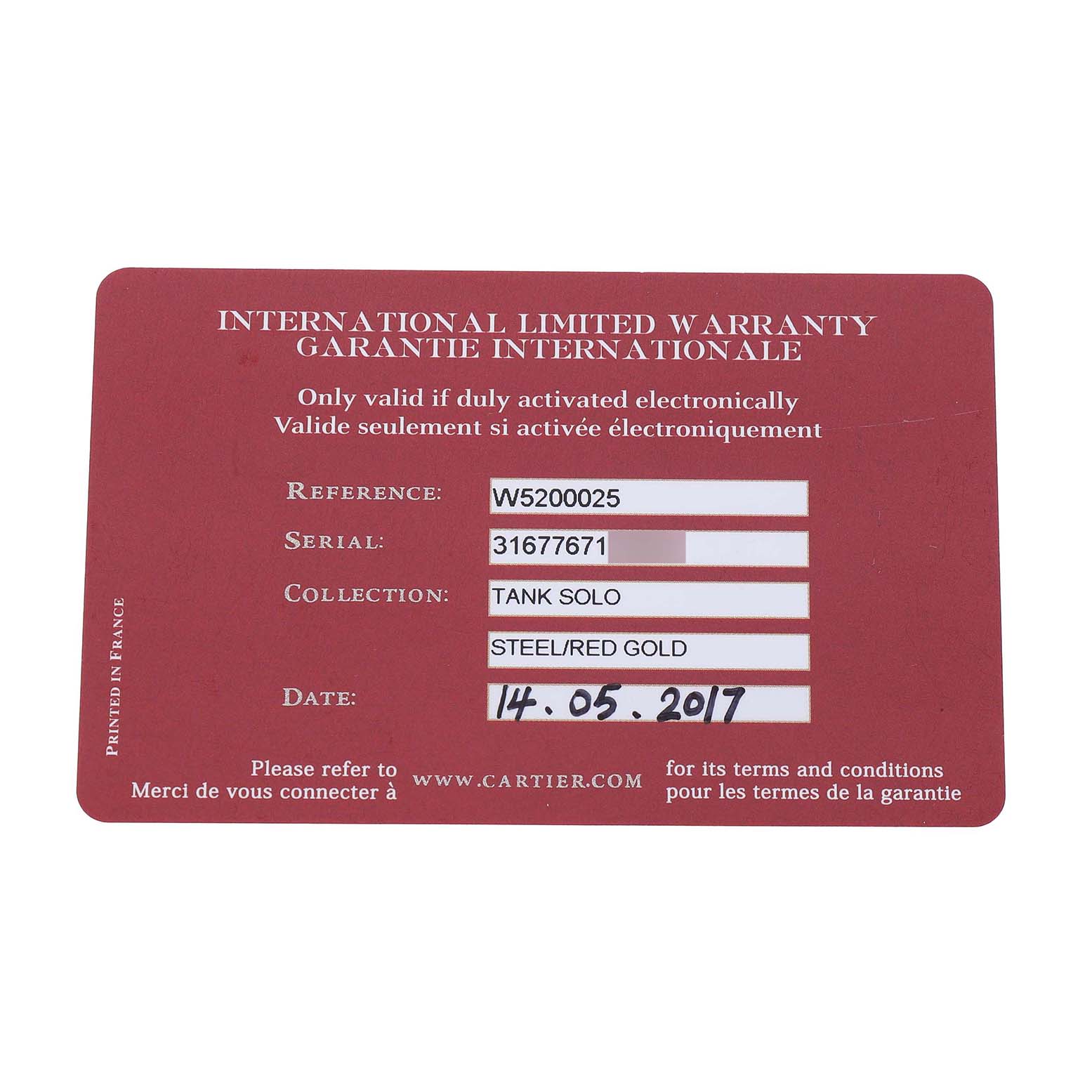 The image shows an international limited warranty card for the Cartier Tank Solo W5200025 Men's Rose Gold Silver Dial watch.