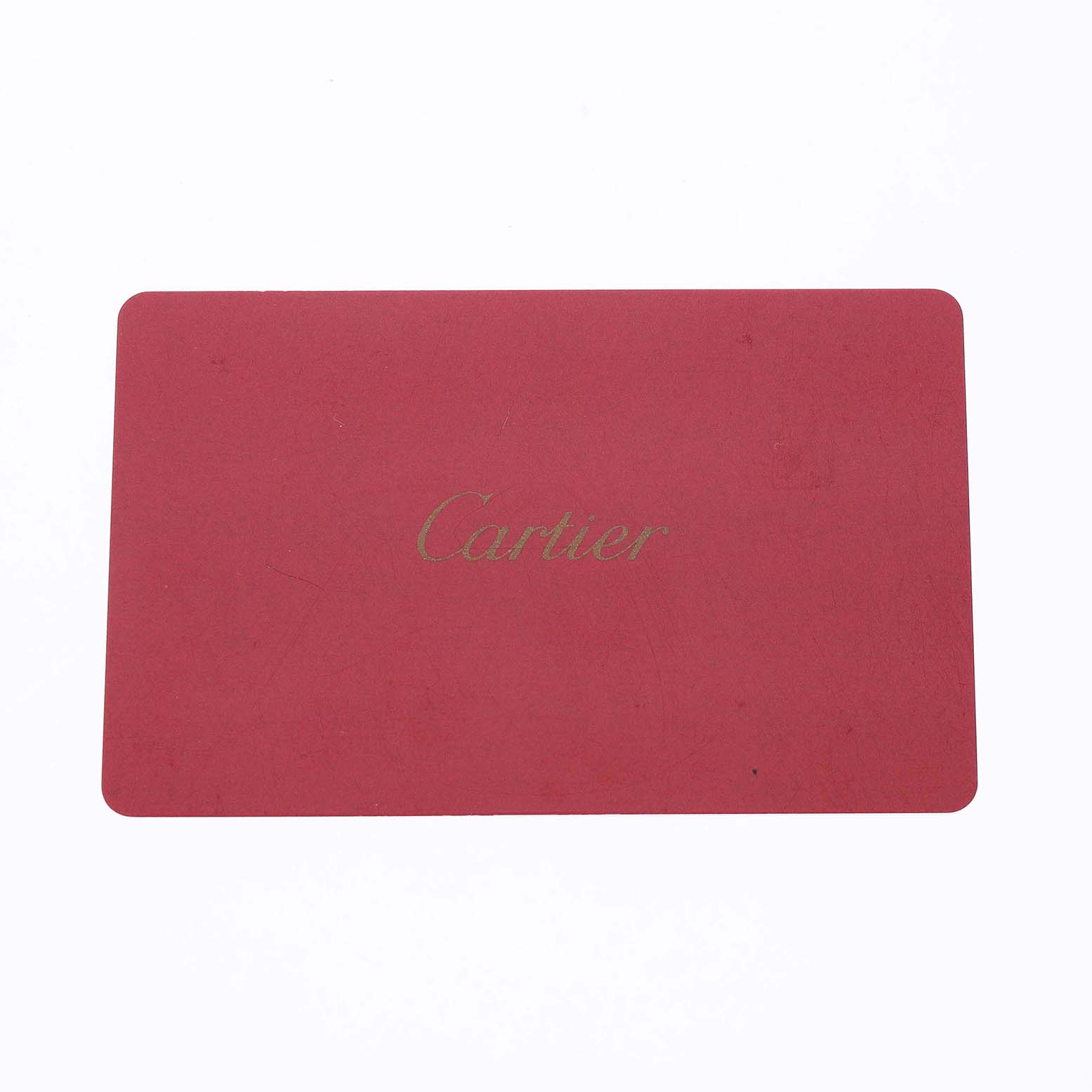 The image shows a red Cartier card associated with the Tank Solo model by Cartier.