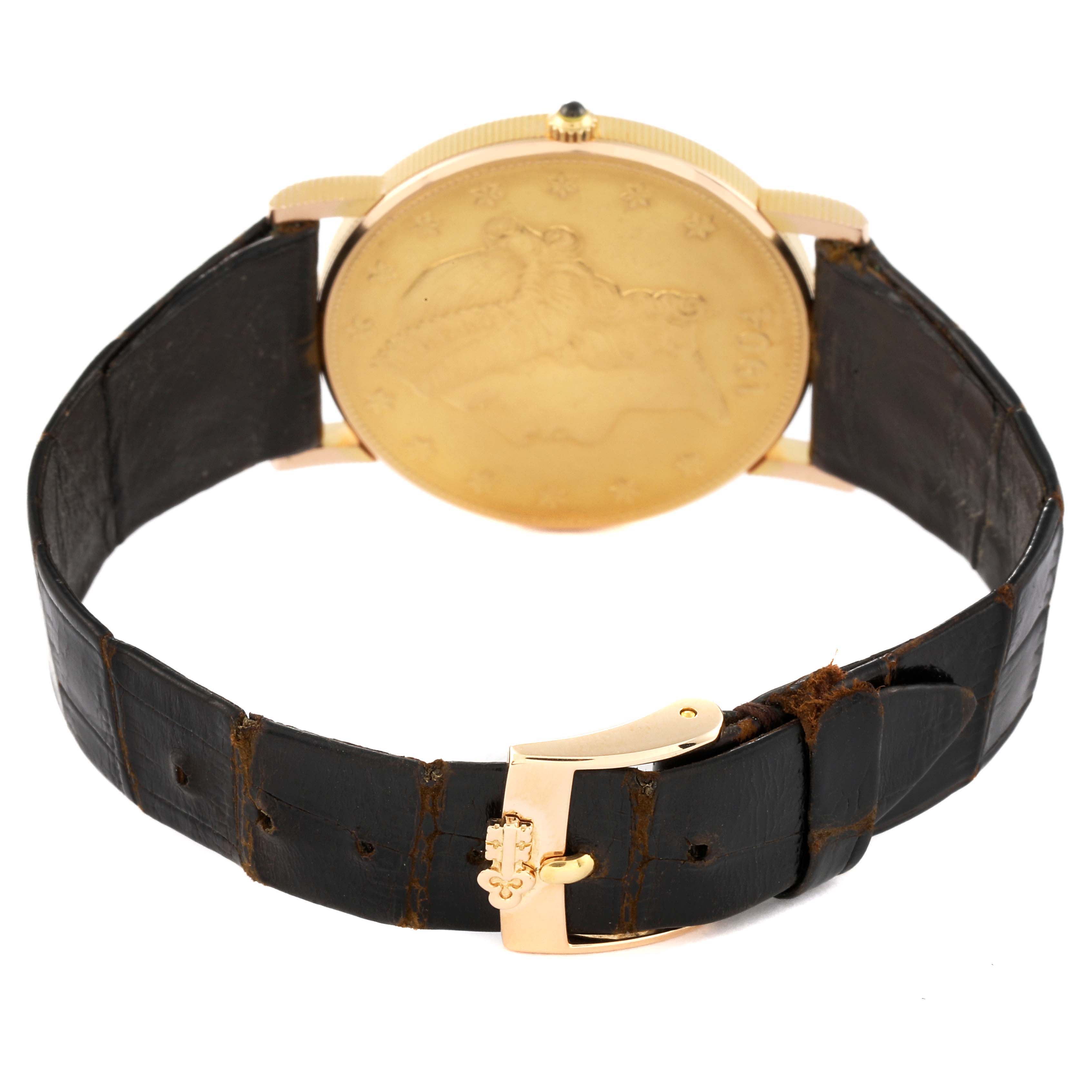 The image shows the back of a Corum Coin Watch 1904 Men's Yellow Gold Champagne Dial 1904 Men's Yellow Gold Champagne Dial model, highlighting its leather strap and clasp.