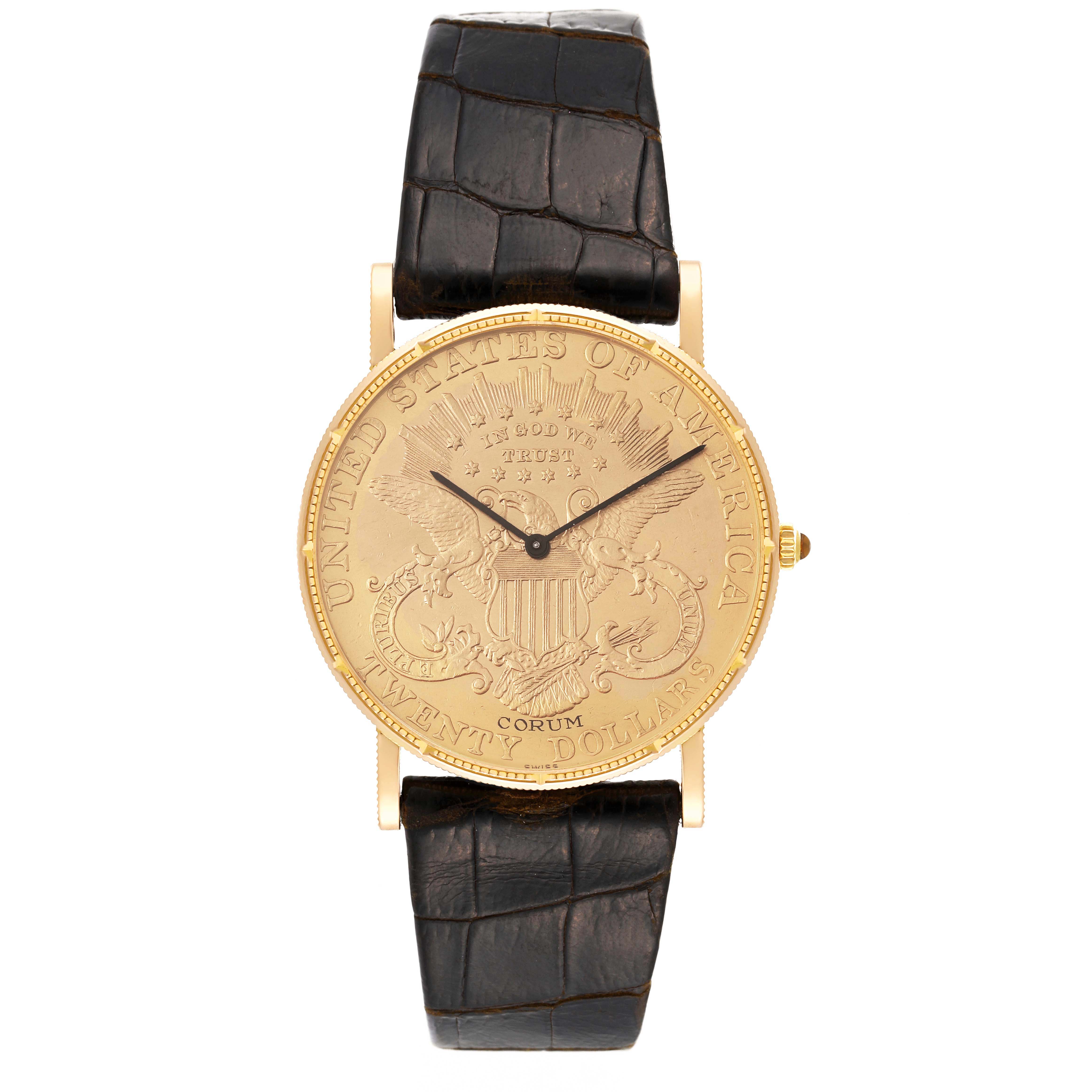 The image shows a Corum Coin Watch 1904 Men's Yellow Gold Champagne Dial 1904 Men's Yellow Gold Champagne Dial model viewed from the front, displaying the dial, hands, and leather strap.