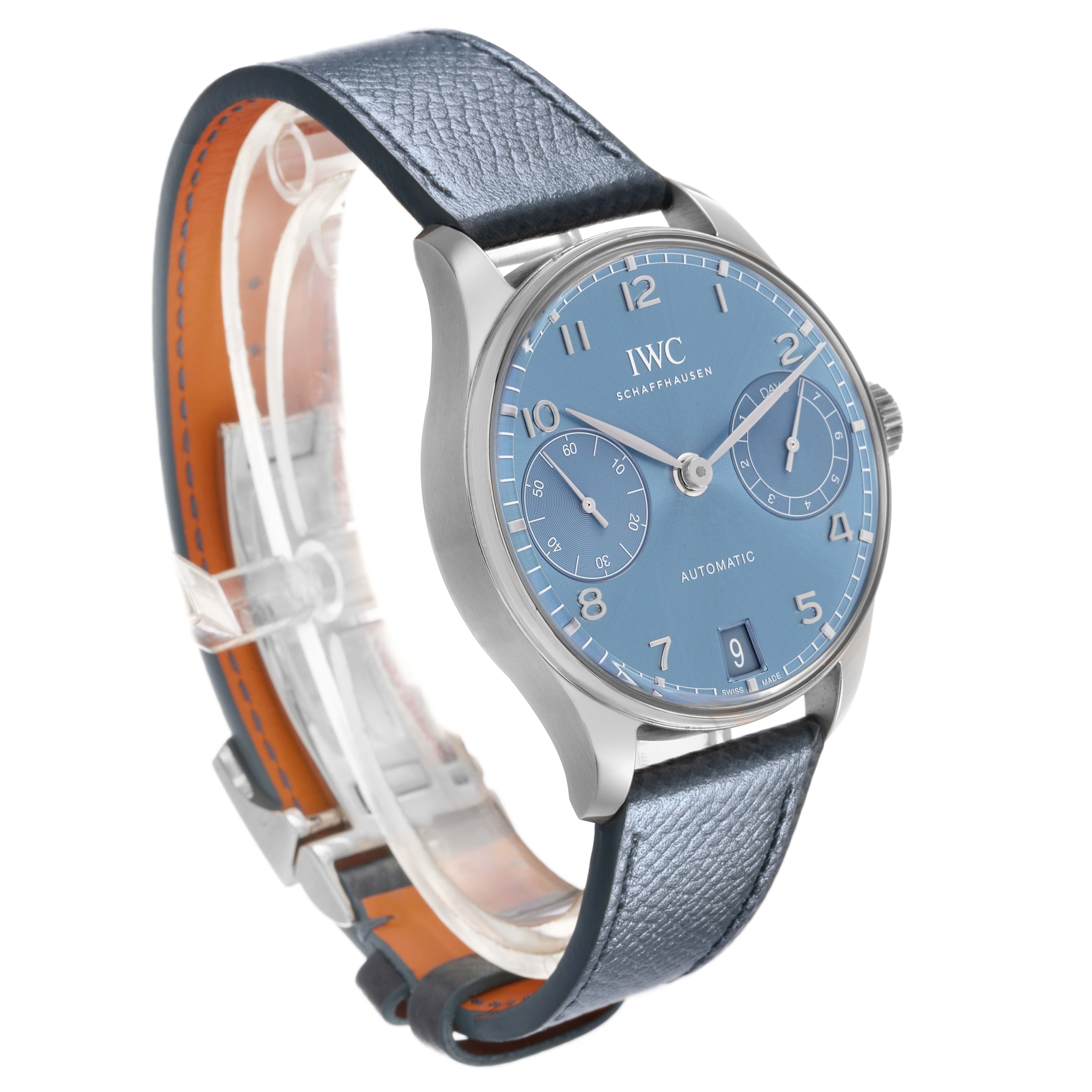 The image shows an IWC Portuguese IW501708 Men's White Gold Blue Dial watch at a three-quarter angle, highlighting the dial, case, crown, and leather strap.