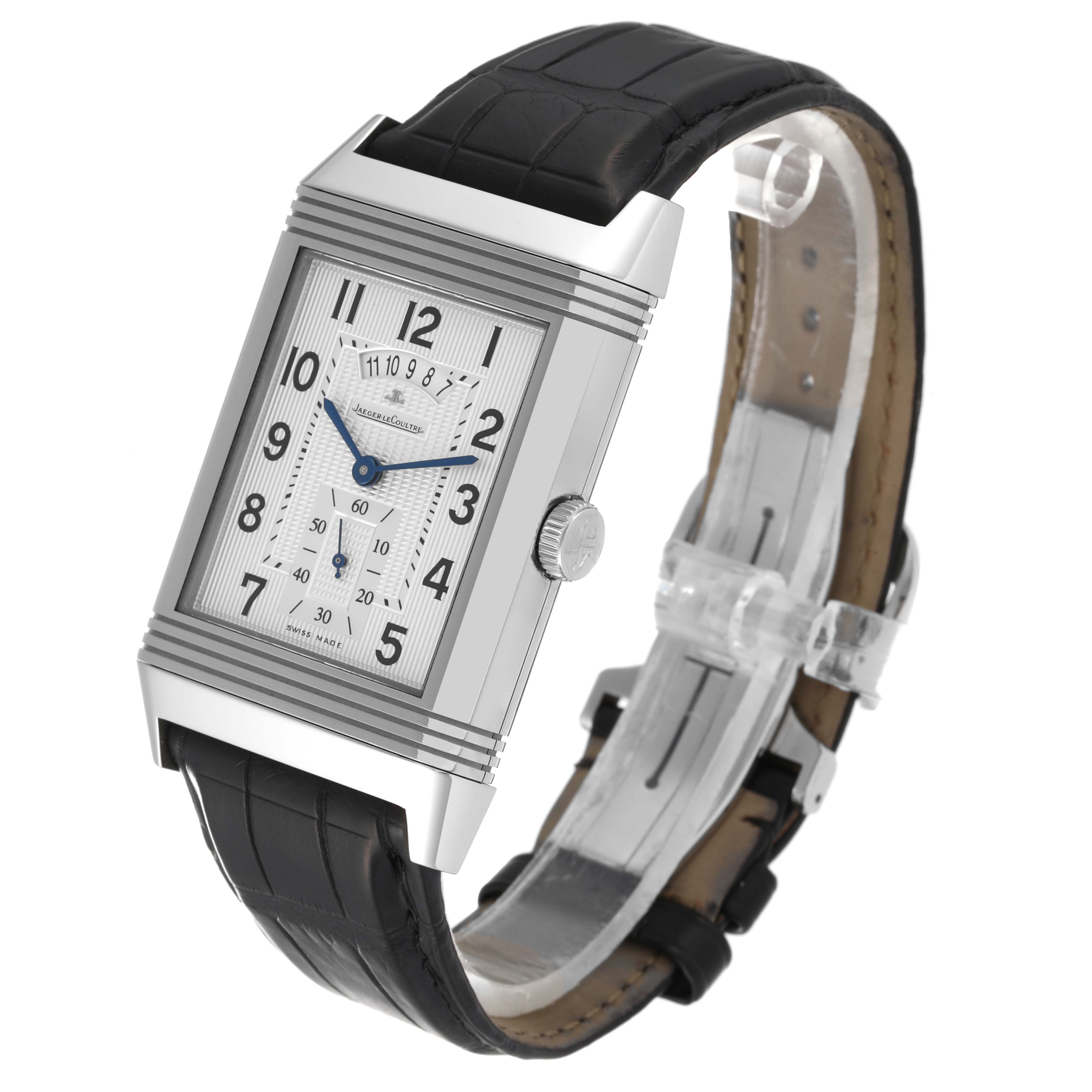 The image shows a Jaeger-LeCoultre Reverso watch at a three-quarter angle, highlighting its rectangular case, dial, and leather strap.