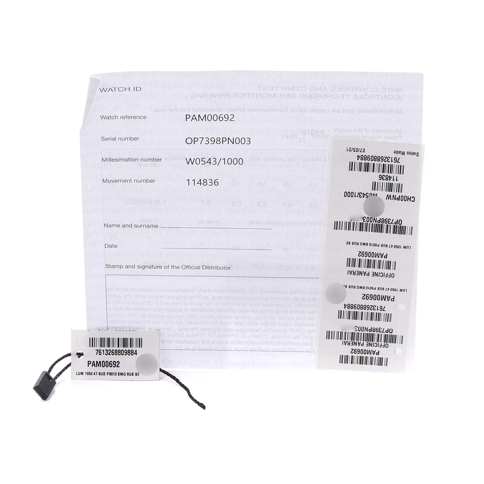 The image shows documentation and tags for a Panerai Submersible PAM00692 Men's Titanium Blue Dial model, viewed from above.