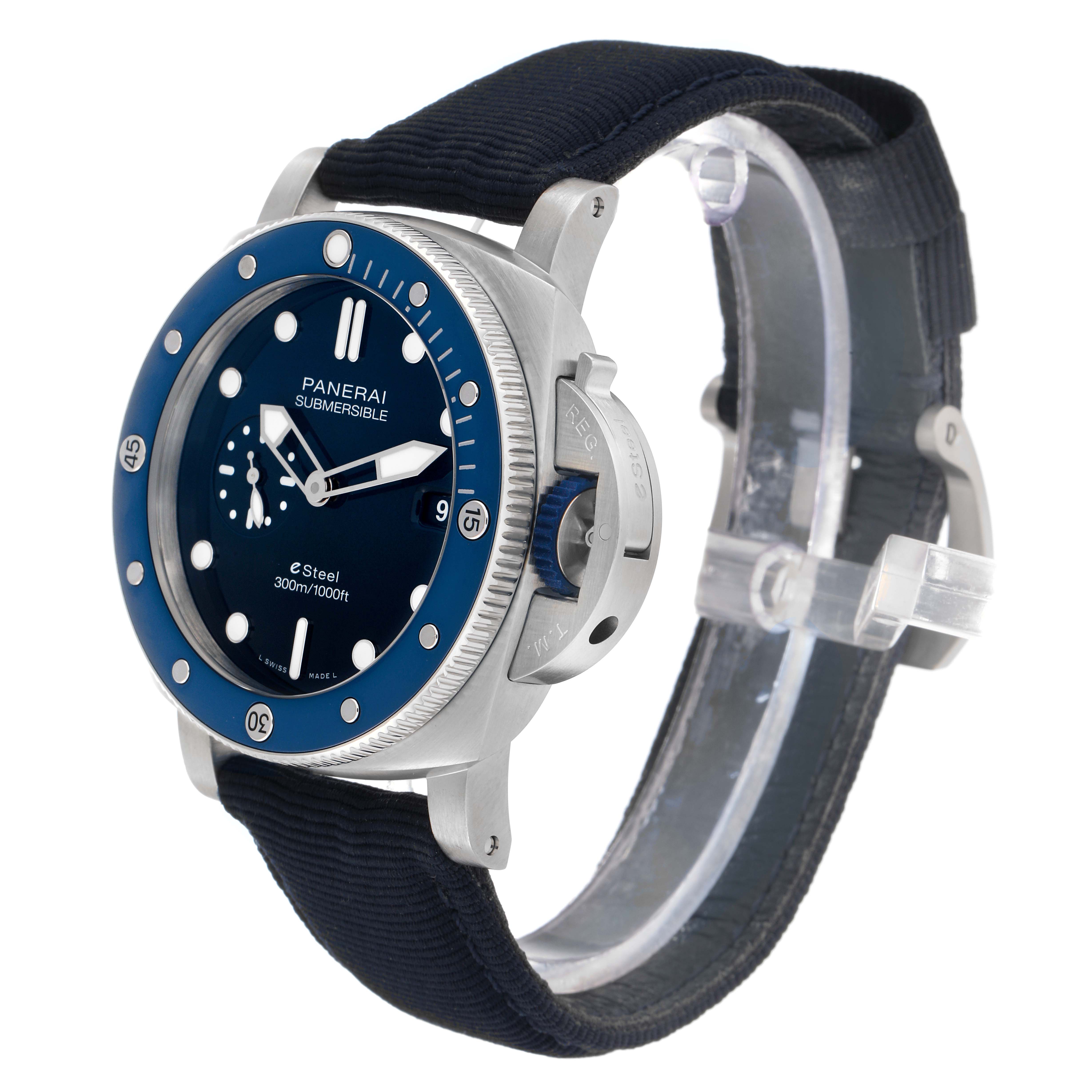 The Panerai Submersible PAM01289 Men's Stainless Steel Blue Dial watch is shown at a three-quarter angle, highlighting the dial, bezel, crown guard, and fabric strap.