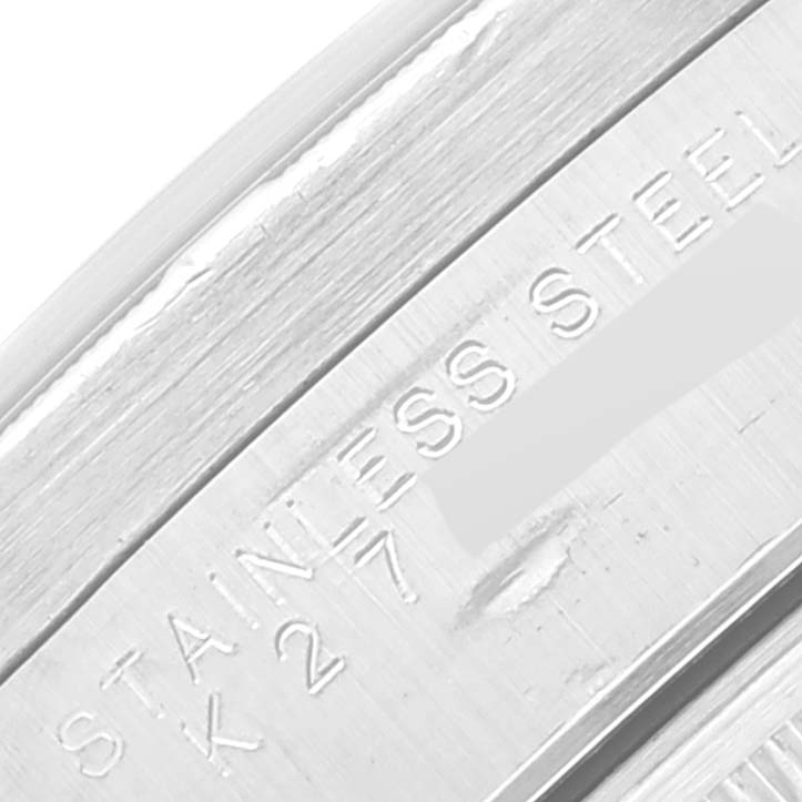 This close-up image shows the engraved serial number and the "STAINLESS STEEL" marking on the side of the Rolex Air-King 14010 Men's Stainless Steel Blue Dial 14010 Men's Stainless Steel Blue Dial watch.