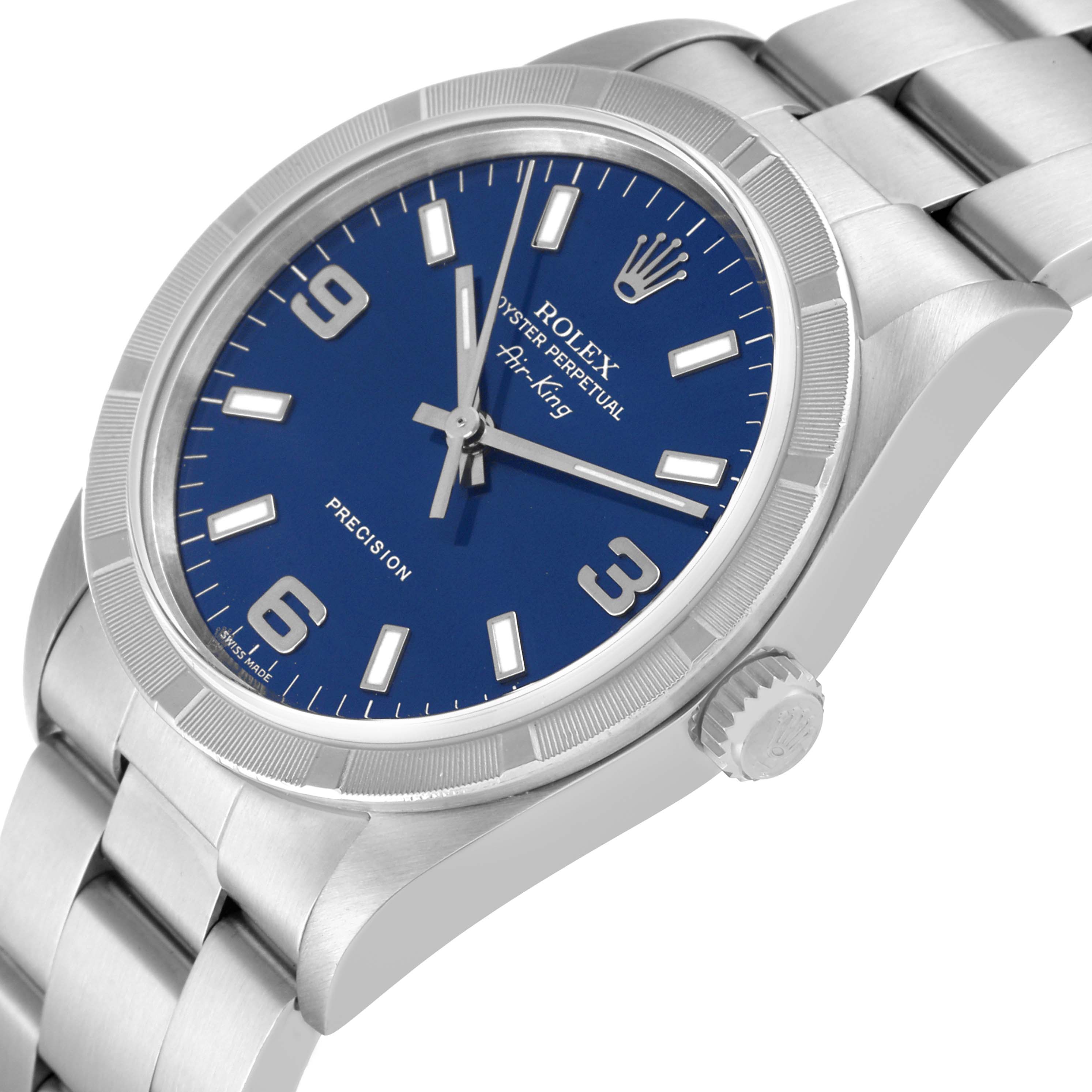 This image shows a Rolex Air-King 14010 Men's Stainless Steel Blue Dial 14010 Men's Stainless Steel Blue Dial watch at an angle highlighting the face, crown, and part of the bracelet.
