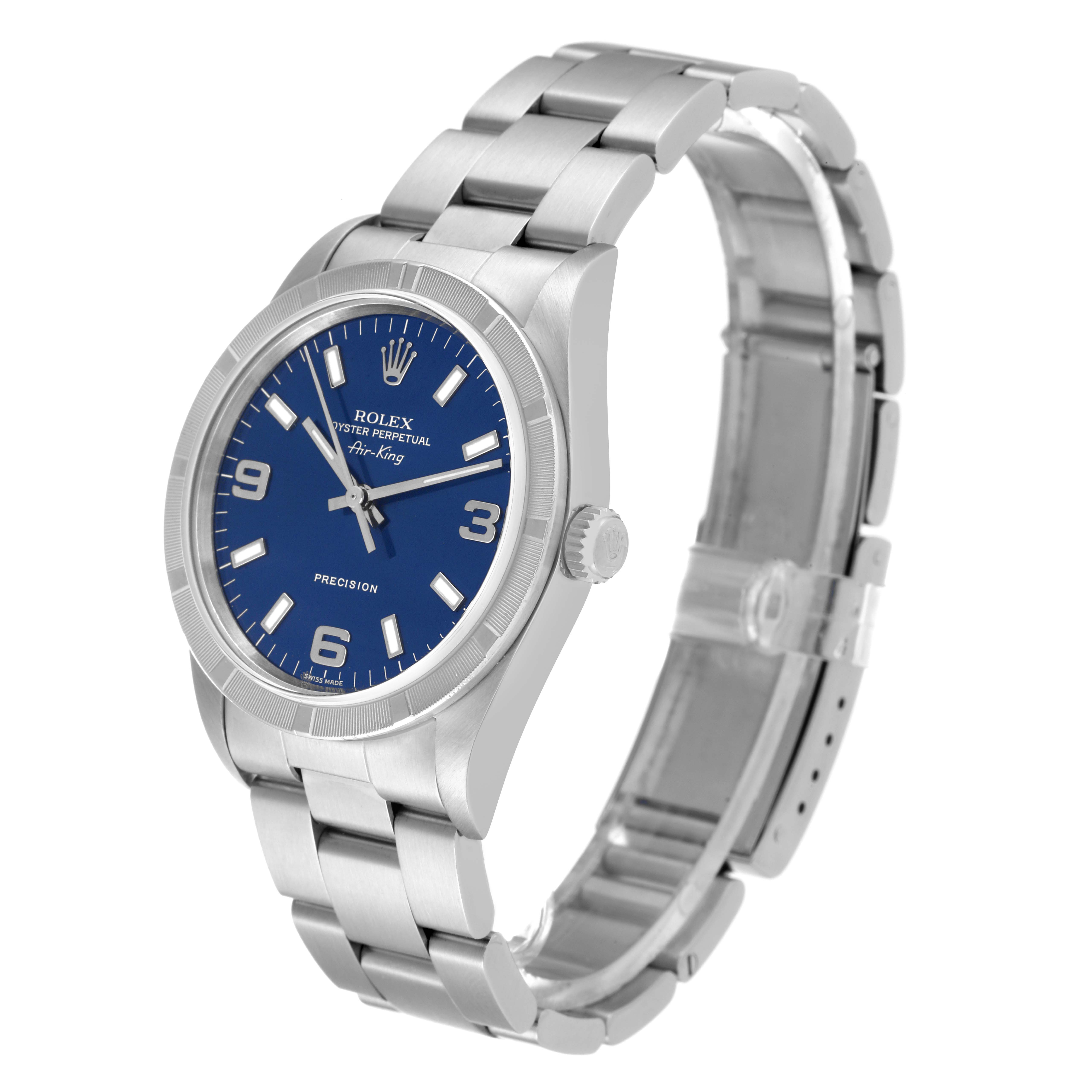 The Rolex Air-King 14010 Men's Stainless Steel Blue Dial 14010 Men's Stainless Steel Blue Dial watch is shown at an angle displaying its blue dial, hour markers, and stainless steel bracelet.