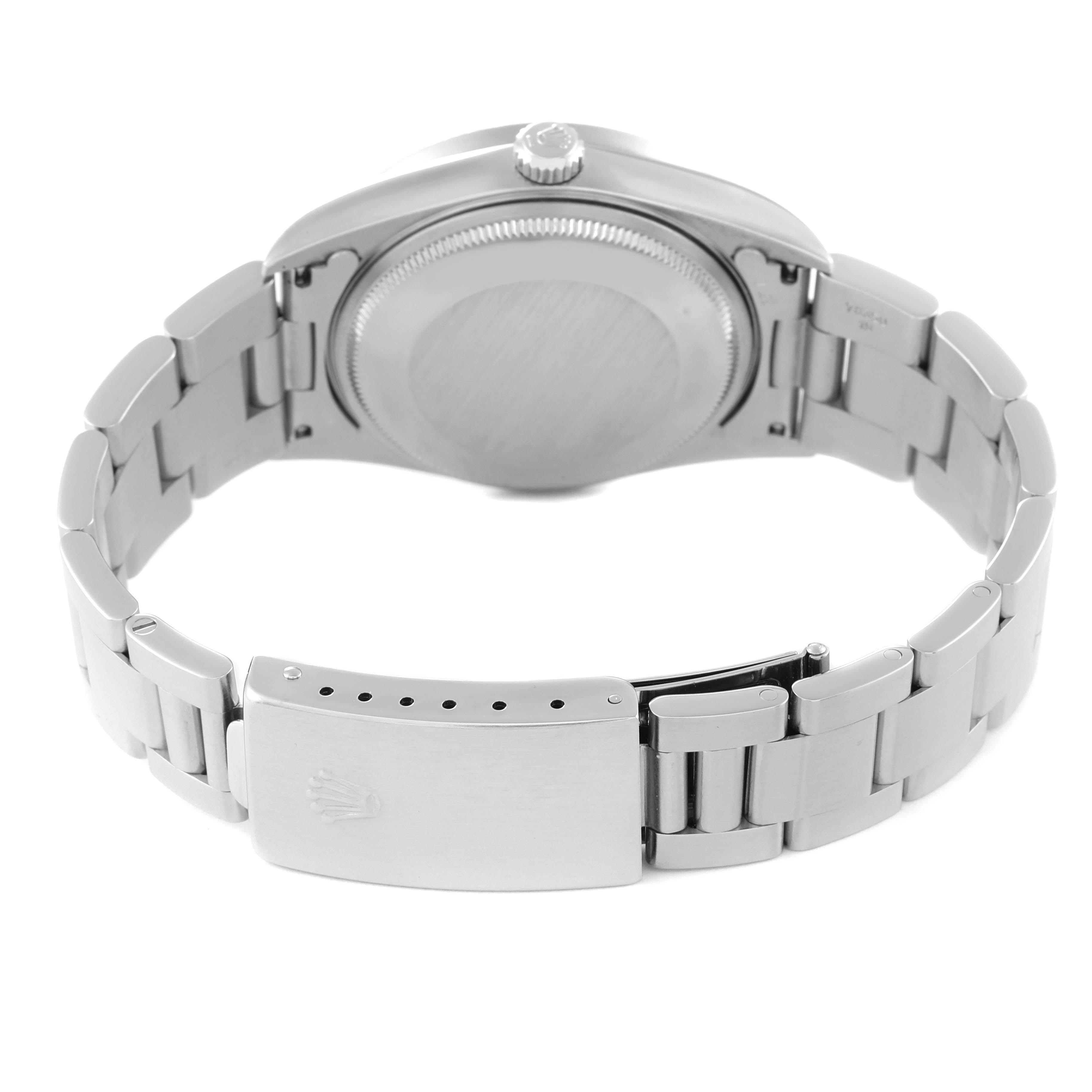 This image shows the back case and stainless steel bracelet of a Rolex Air-King 14010 Men's Stainless Steel Blue Dial 14010 Men's Stainless Steel Blue Dial watch from a rear angle.