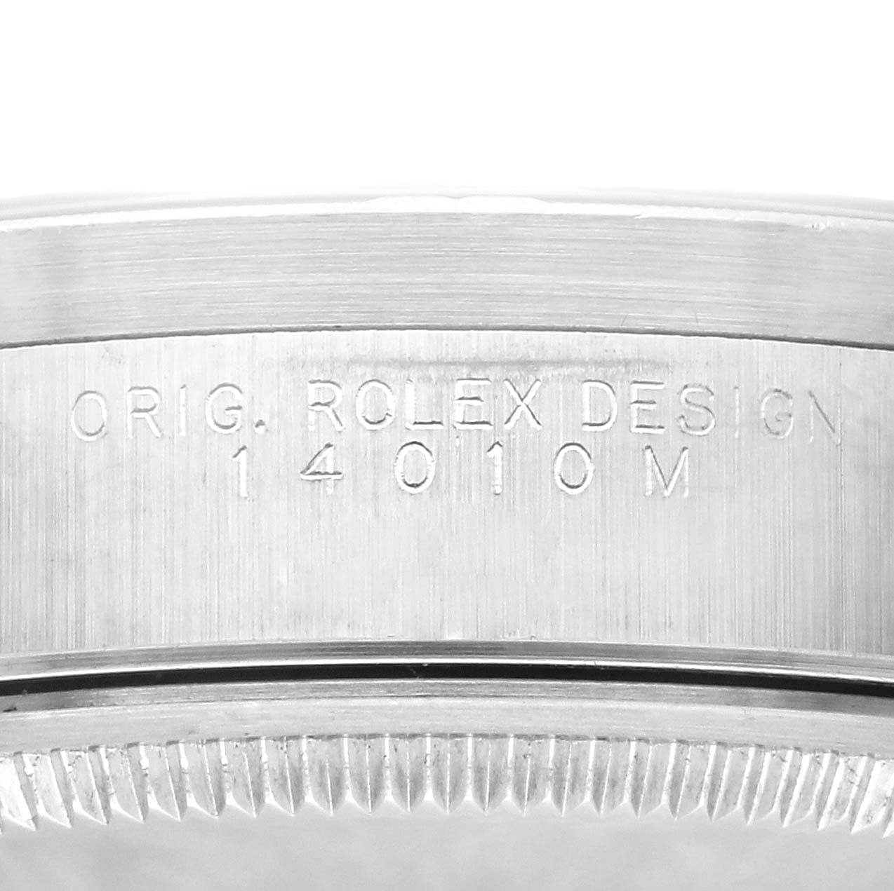 This close-up image shows the side of the bezel and casing, specifically the model number engraving of a Rolex Air-King 14010M Men's Stainless Steel Black Dial 14010M Men's Stainless Steel Black Dial watch.