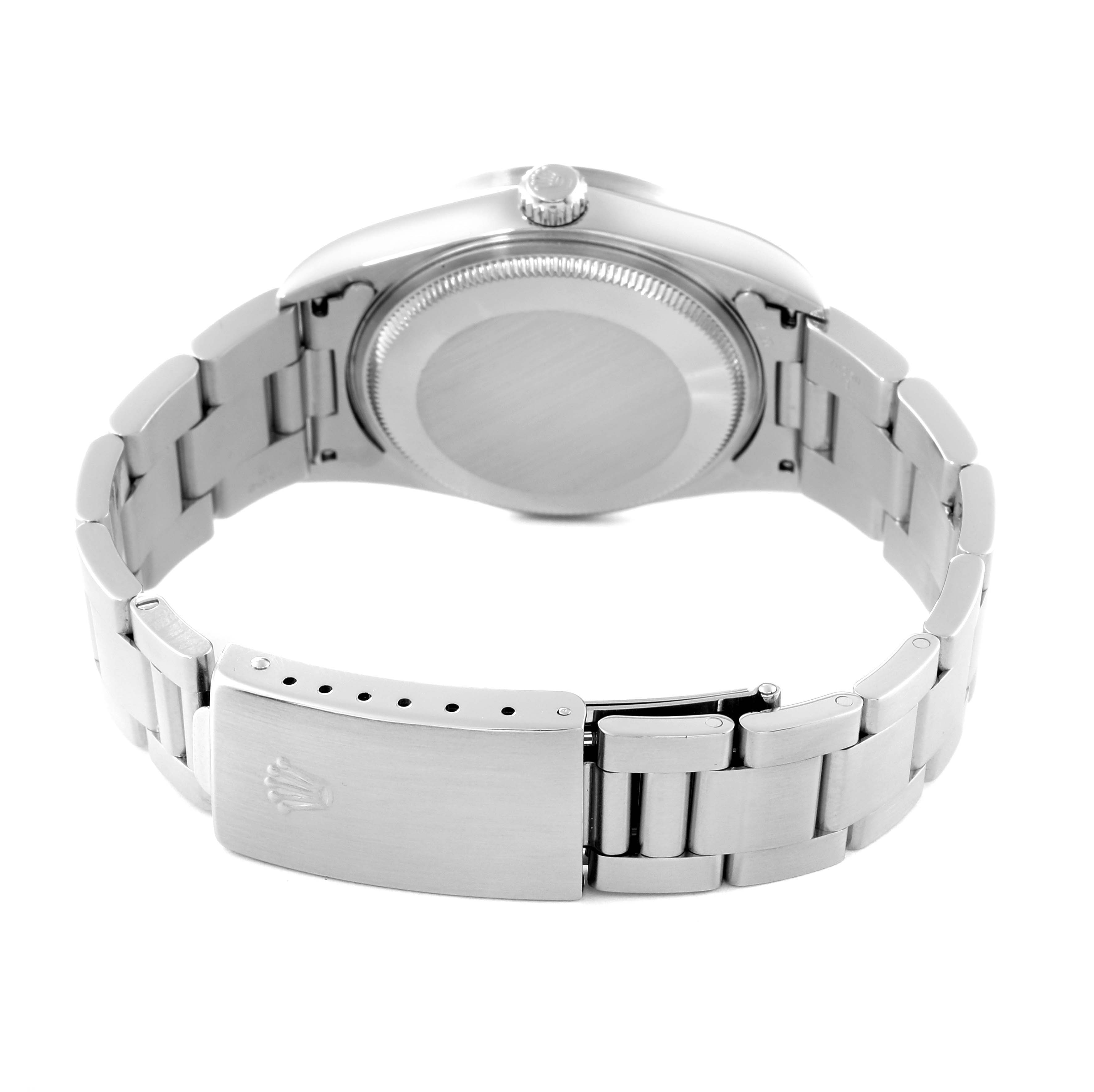 This image shows the back view of a Rolex Air-King 14010M Men's Stainless Steel Black Dial 14010M Men's Stainless Steel Black Dial watch, highlighting its stainless steel case back and bracelet, including the clasp.