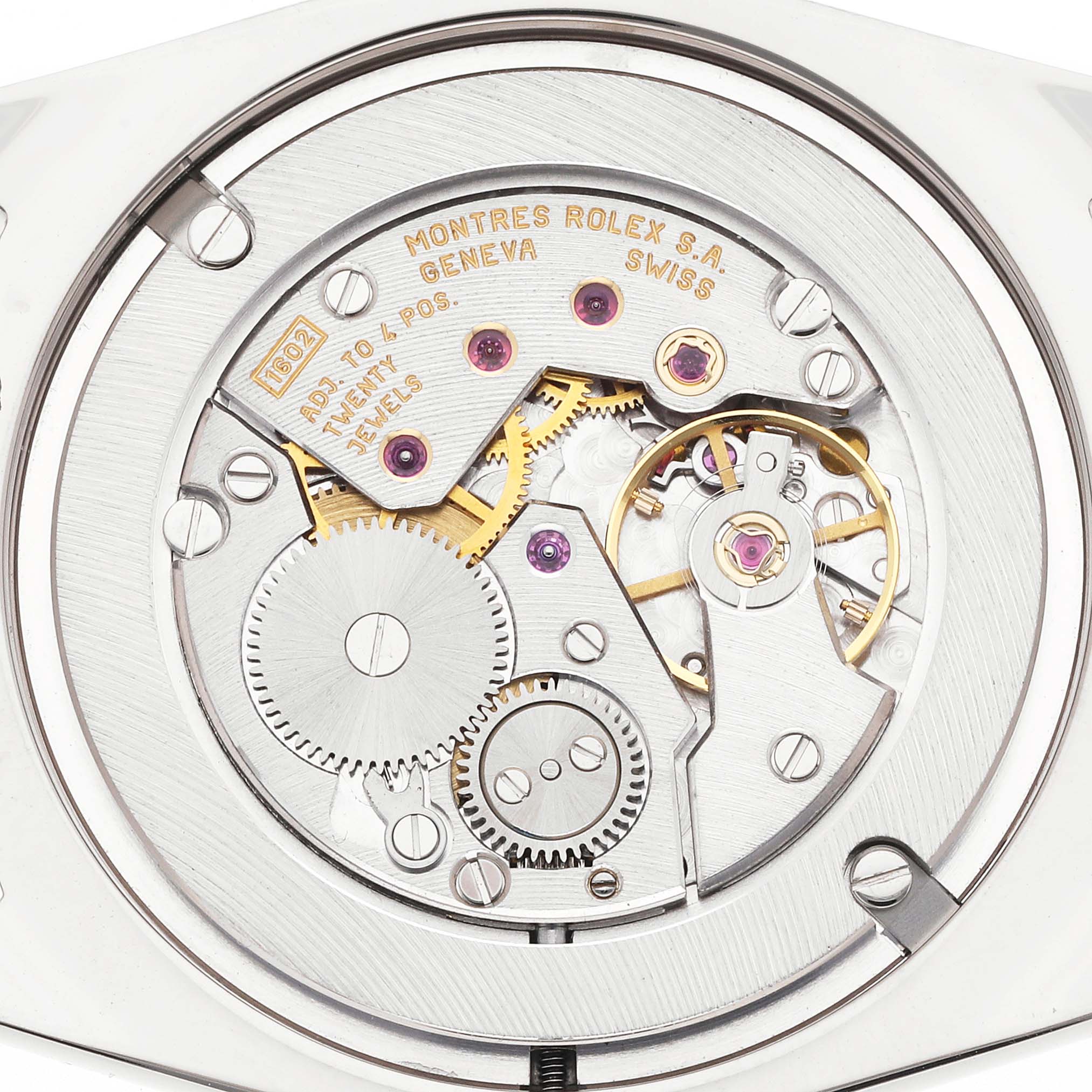 This image shows the movement and inner mechanics of a Rolex Cellini 4233 Men
s White Gold White Dial watch from a back view.