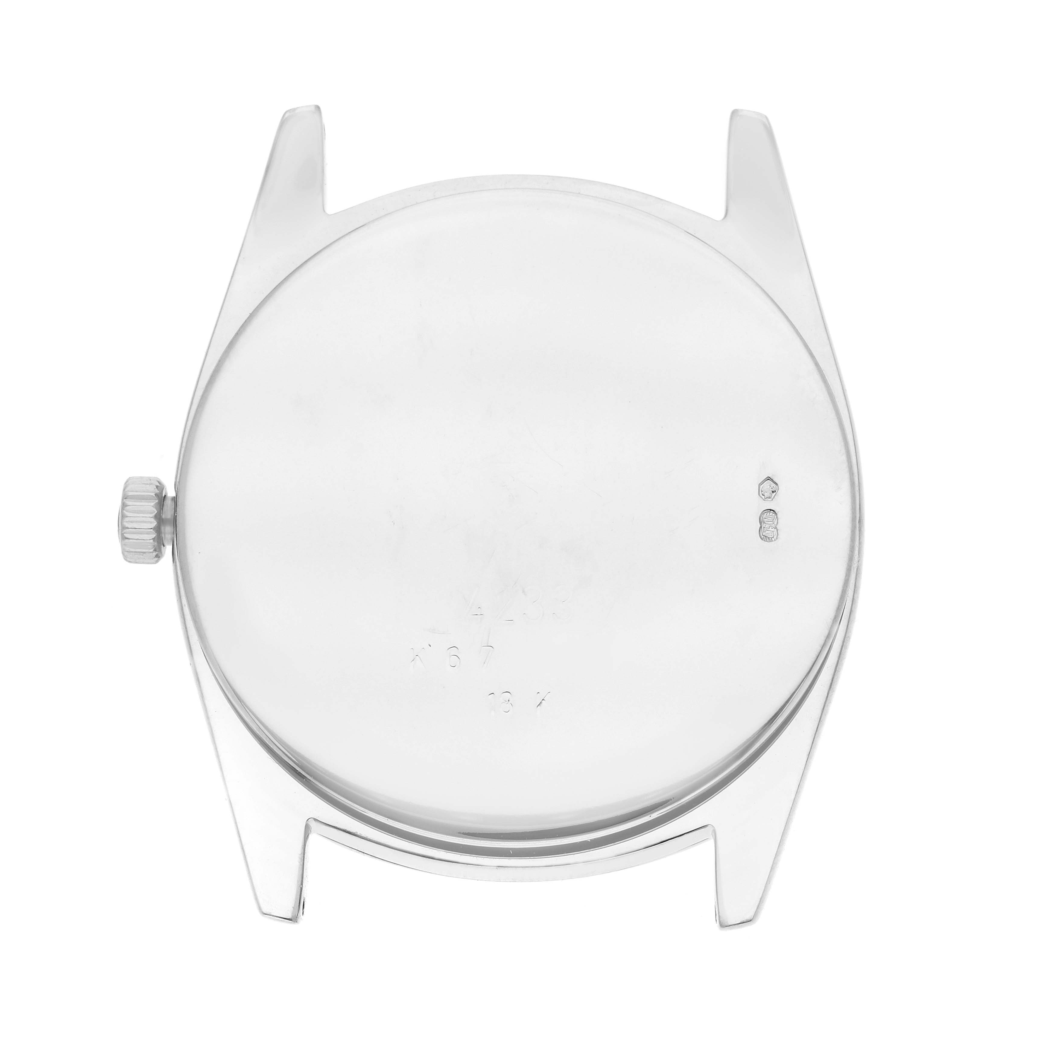 The image shows the back view of a Rolex Cellini 4233 Men
s White Gold White Dial watch case, including the crown and lugs.