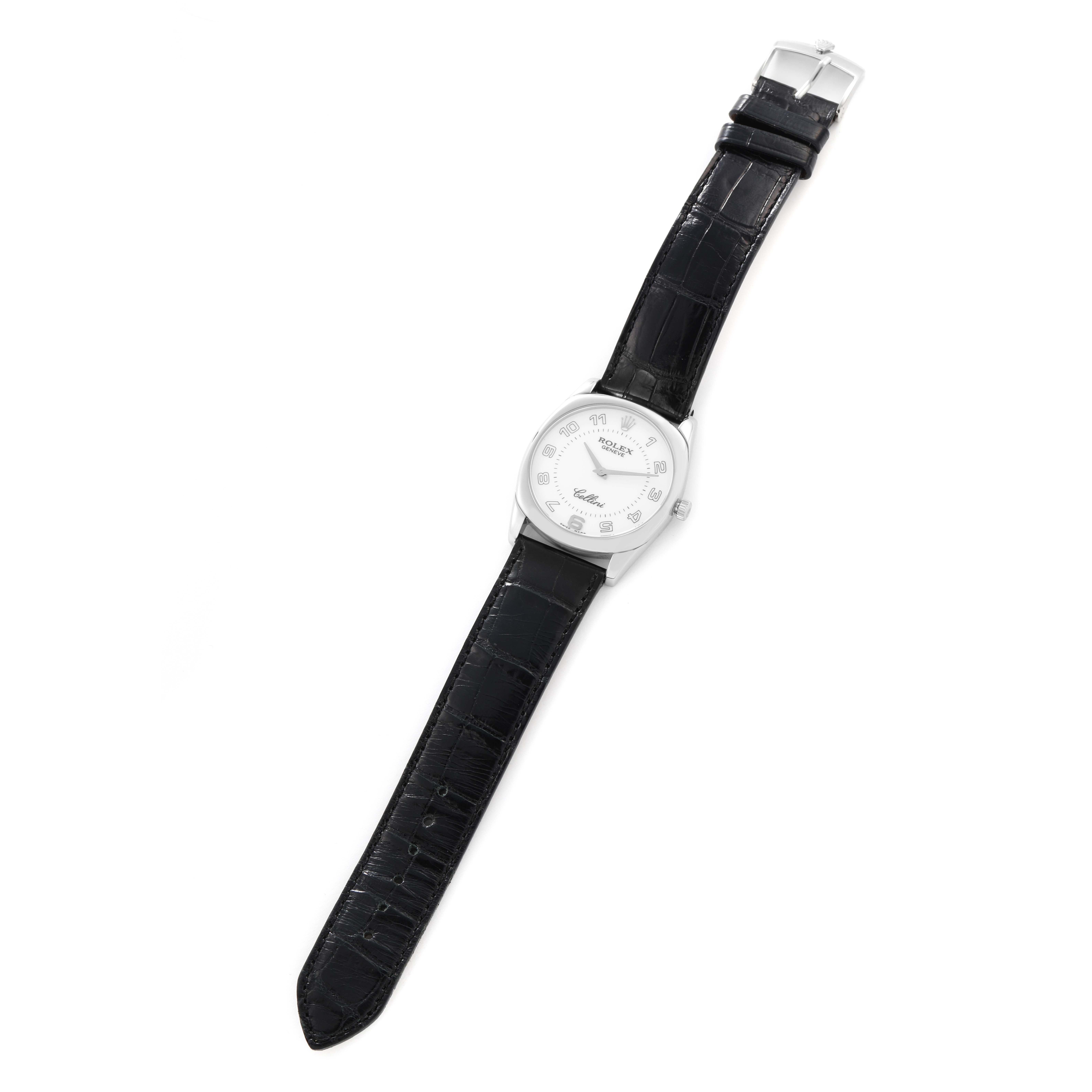 The Rolex Cellini 4233 Men
s White Gold White Dial watch is shown from a top-down angle, displaying the full watch face, leather strap, and clasp.