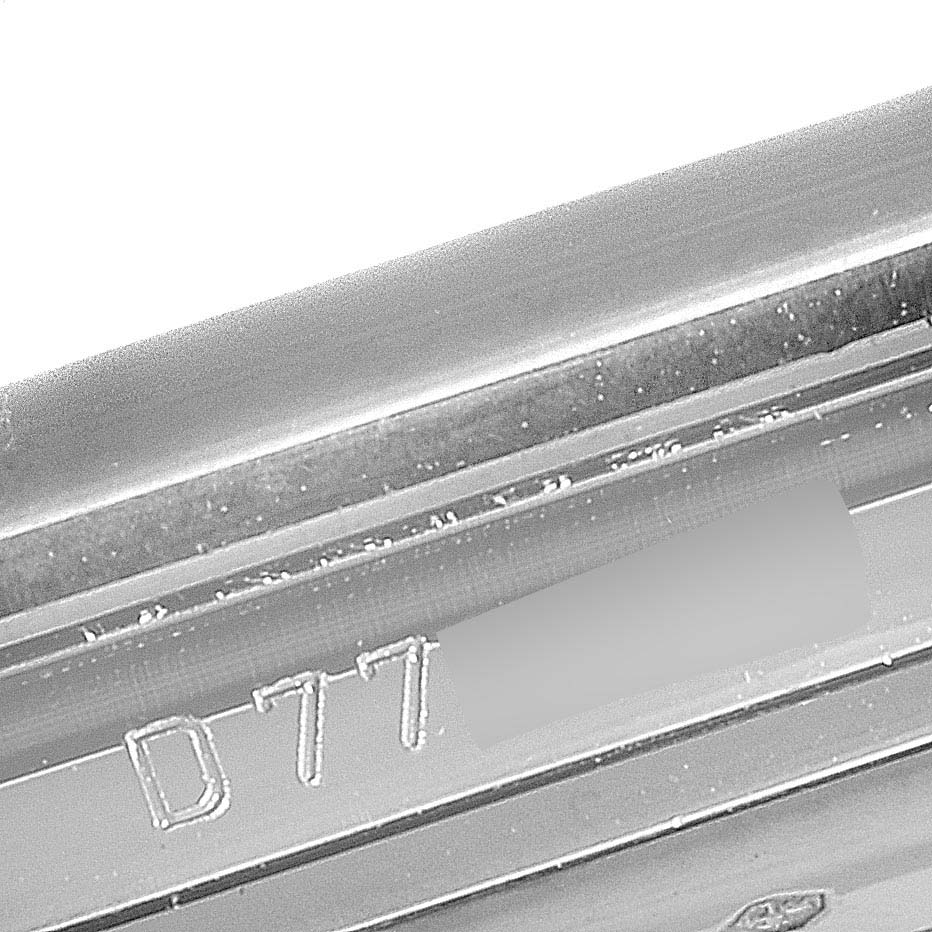 This image shows a close-up view of the inner case back engraving of a Rolex Cellini 5443/9 Men's White Gold Black Dial 5443/9 Men's White Gold Black Dial watch.