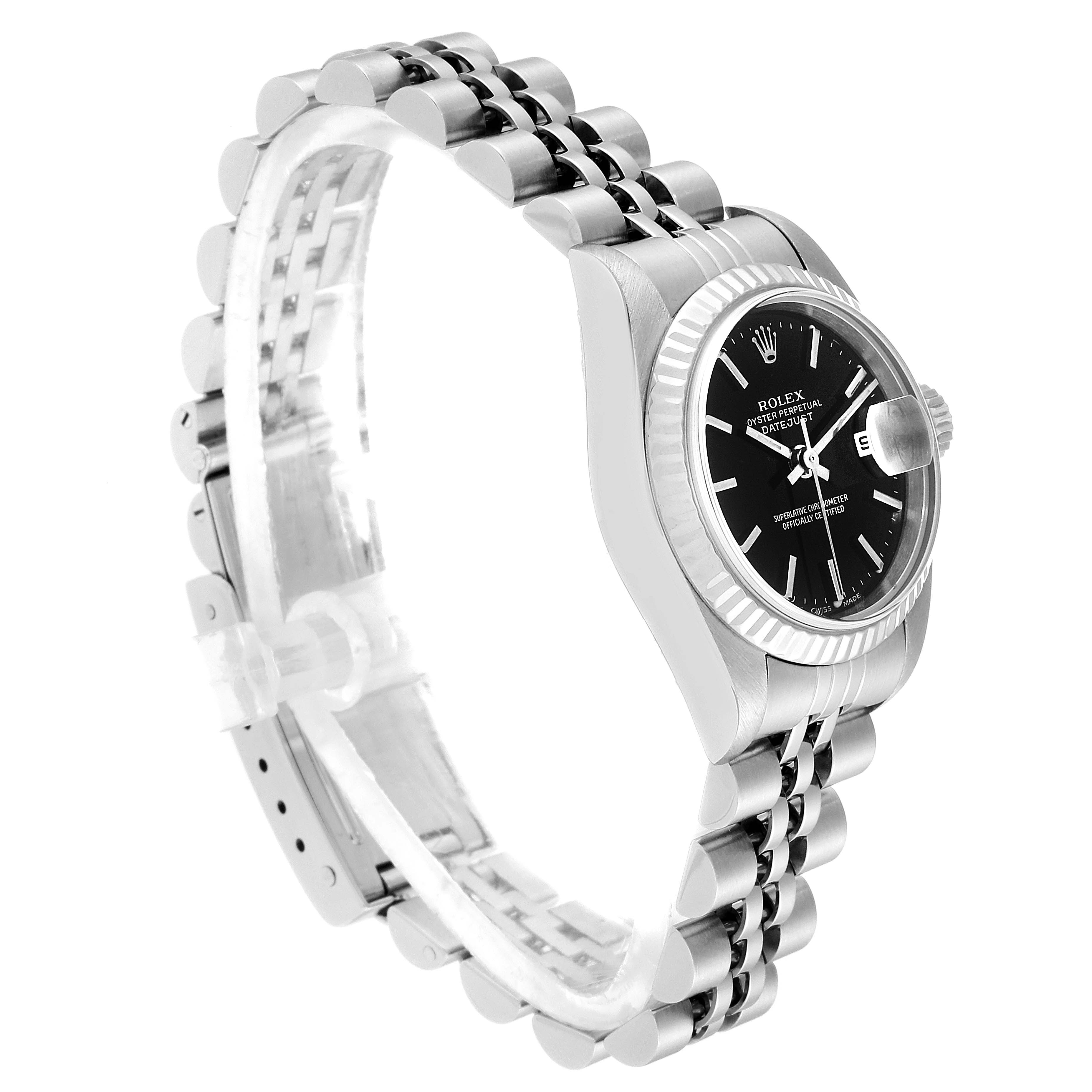 The image shows a side angle of a Rolex Datejust 79174 Women's Stainless Steel Black Dial 79174 Women's Stainless Steel Black Dial watch, clearly displaying the dial, case, fluted bezel, bracelet, and clasp.