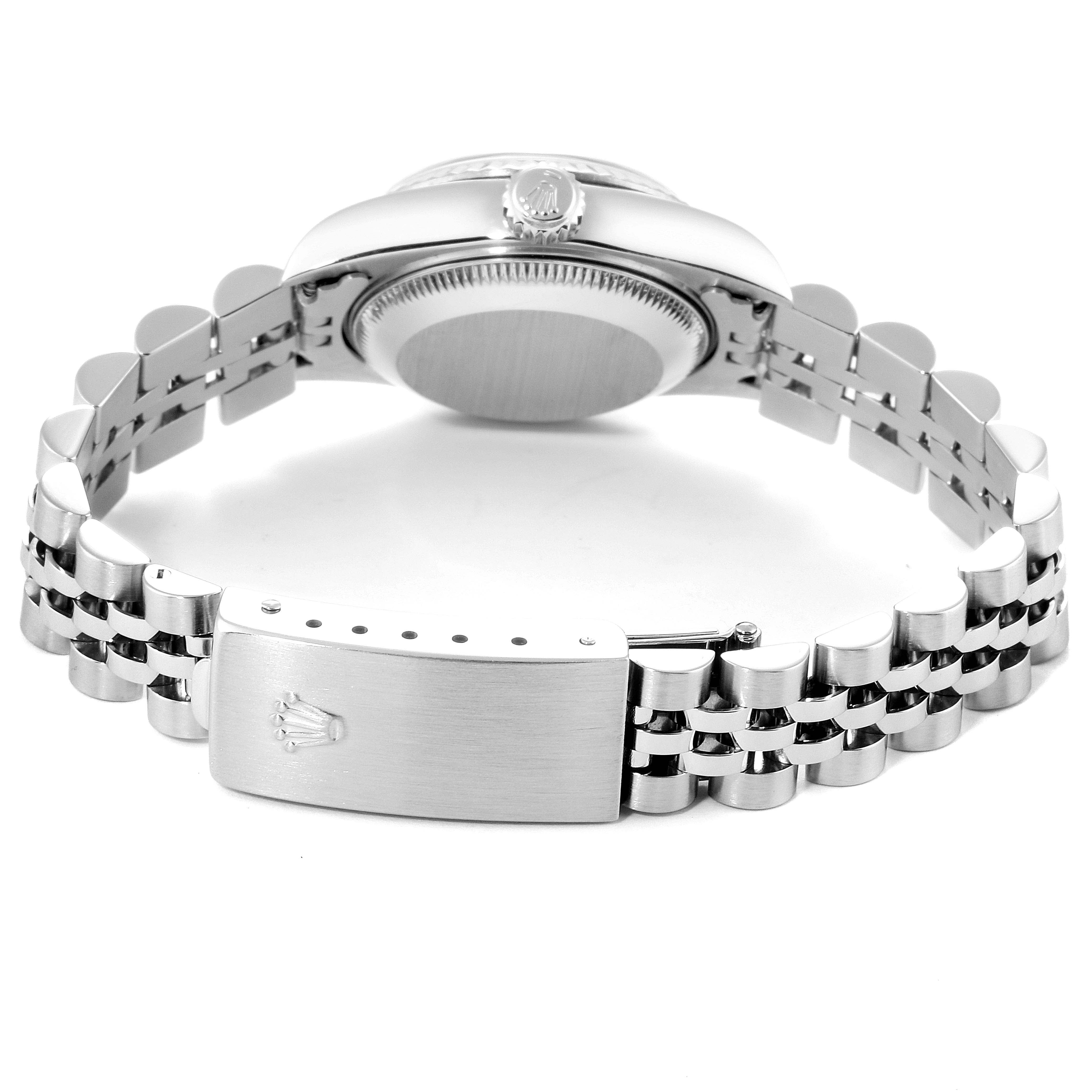 This image shows the back of a Rolex Datejust 79174 Women's Stainless Steel Black Dial 79174 Women's Stainless Steel Black Dial watch, highlighting the bracelet, clasp, and case back.