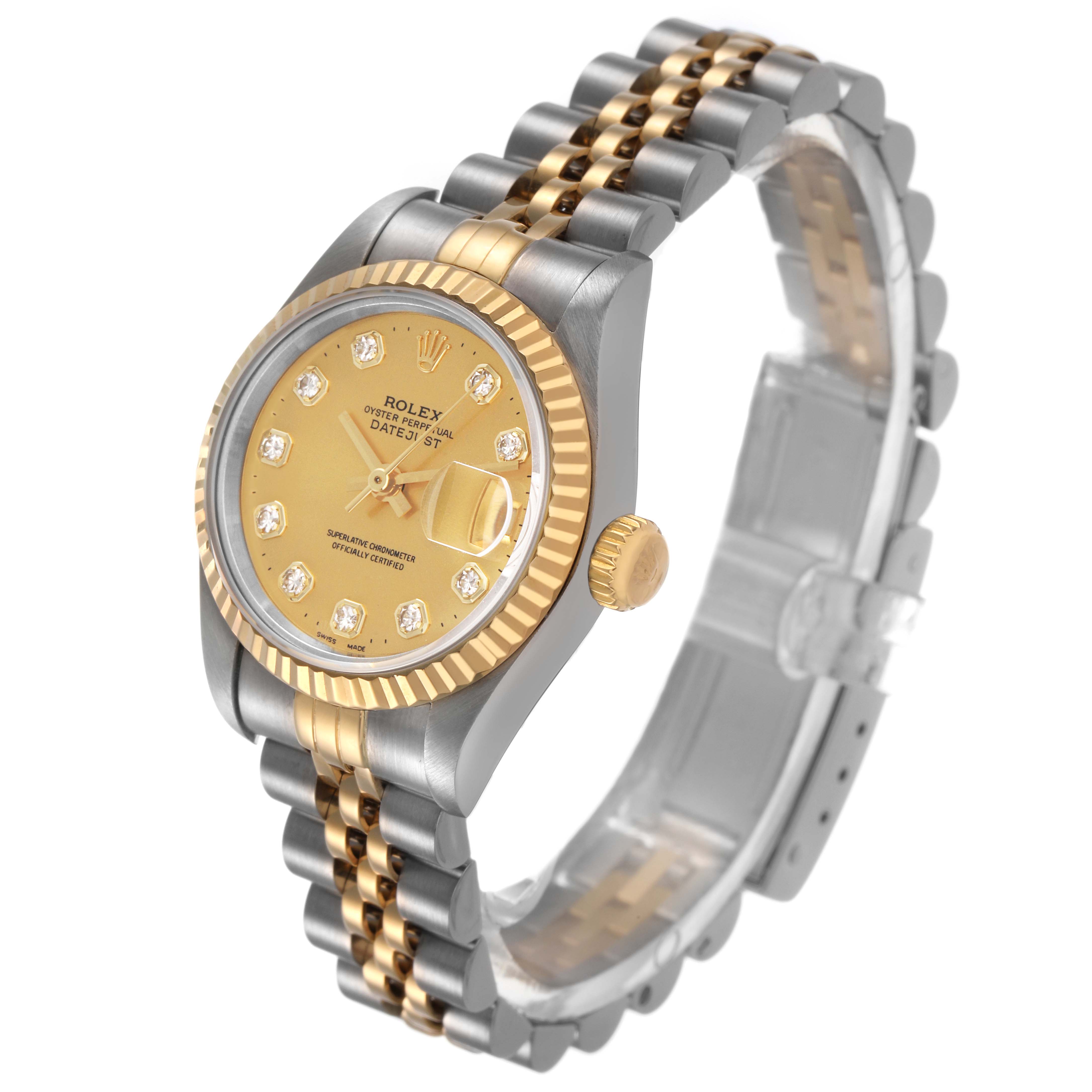 The Rolex Datejust 69173 Women's Steel and Gold (two tone) Champagne Dial watch is shown at a three-quarter angle, featuring its gold and silver bracelet, fluted bezel, and champagne dial.