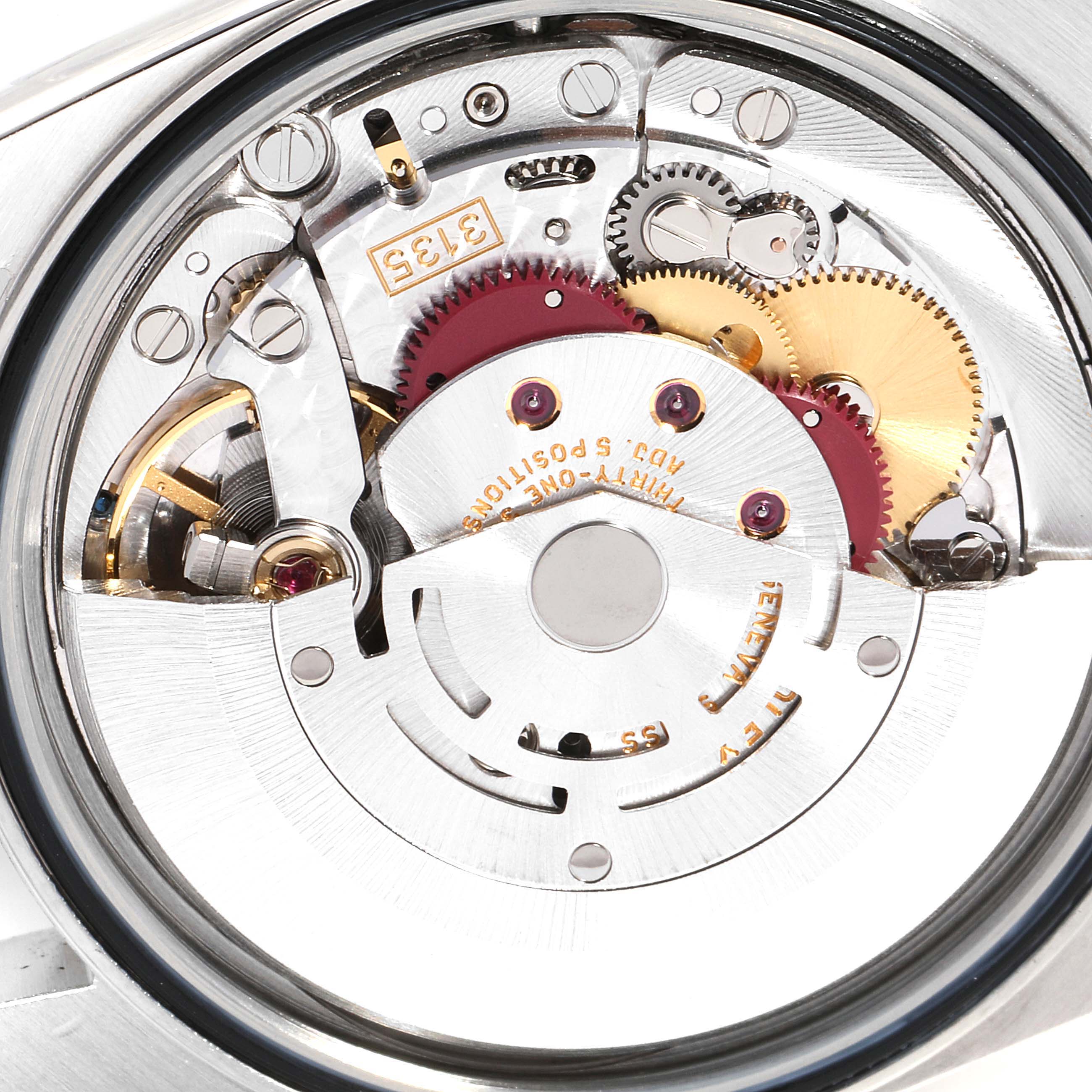 This close-up image shows the intricate movement and internal mechanisms of a Rolex Datejust 16234 Men's Stainless Steel Blue Dial 16234 Men's Stainless Steel Blue Dial watch.
