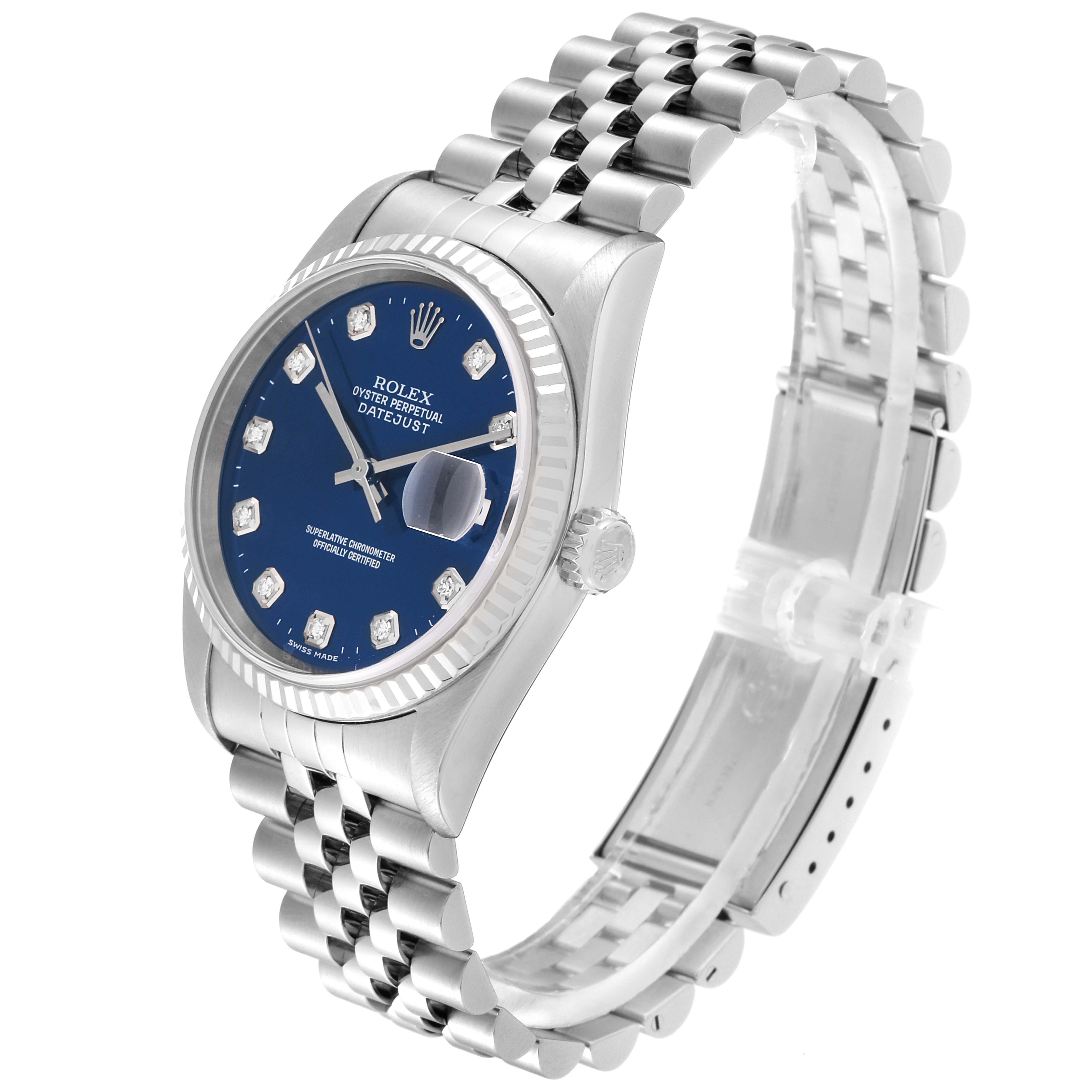 The Rolex Datejust 16234 Men's Stainless Steel Blue Dial 16234 Men's Stainless Steel Blue Dial watch is shown at an angle displaying the face, bracelet, fluted bezel, and crown.