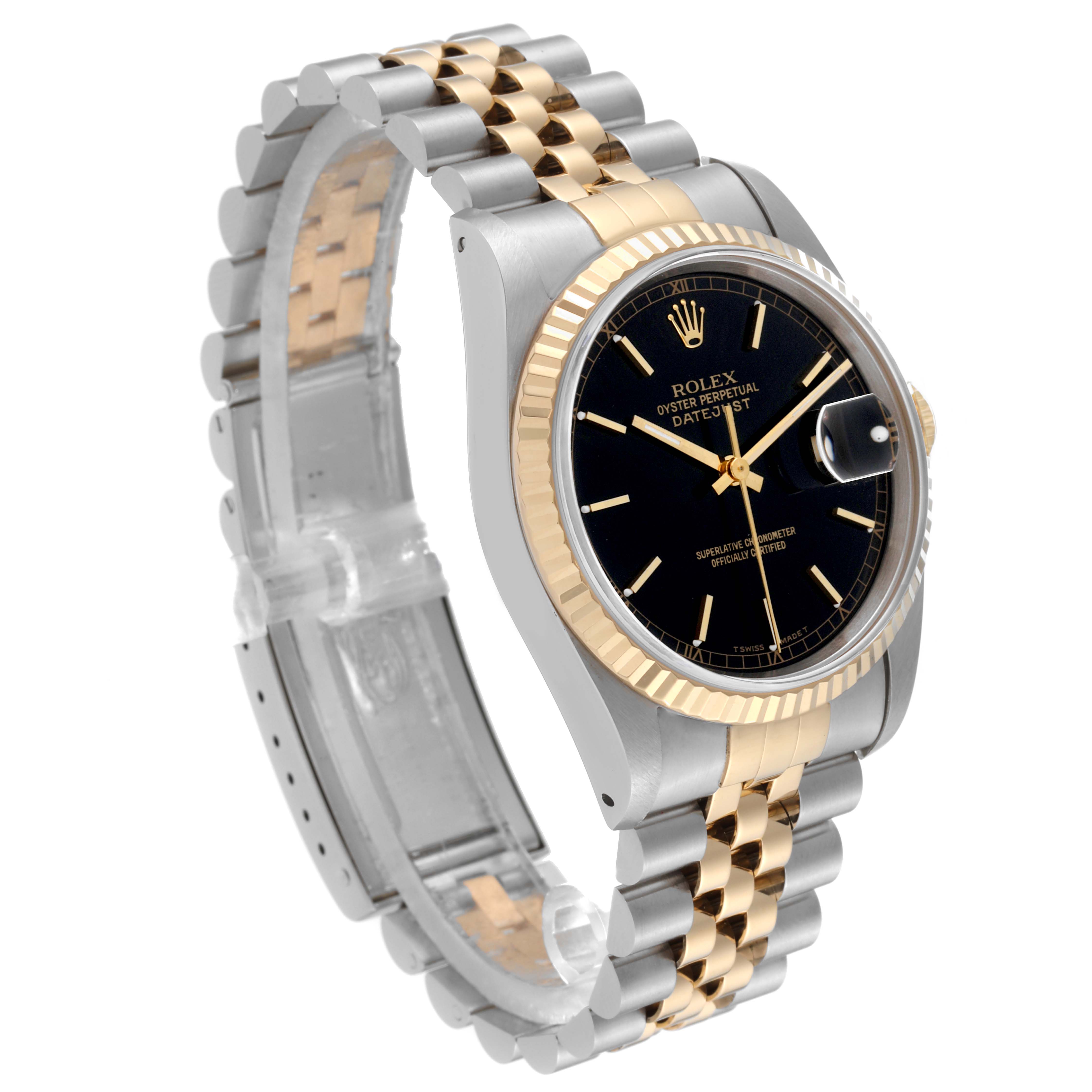 This image shows a Rolex Datejust 16233 Men's Steel and Gold (two tone) Black Dial 16233 Men's Steel and Gold (two tone) Black Dial watch from an angled perspective, highlighting its dial, bezel, and two-tone bracelet.