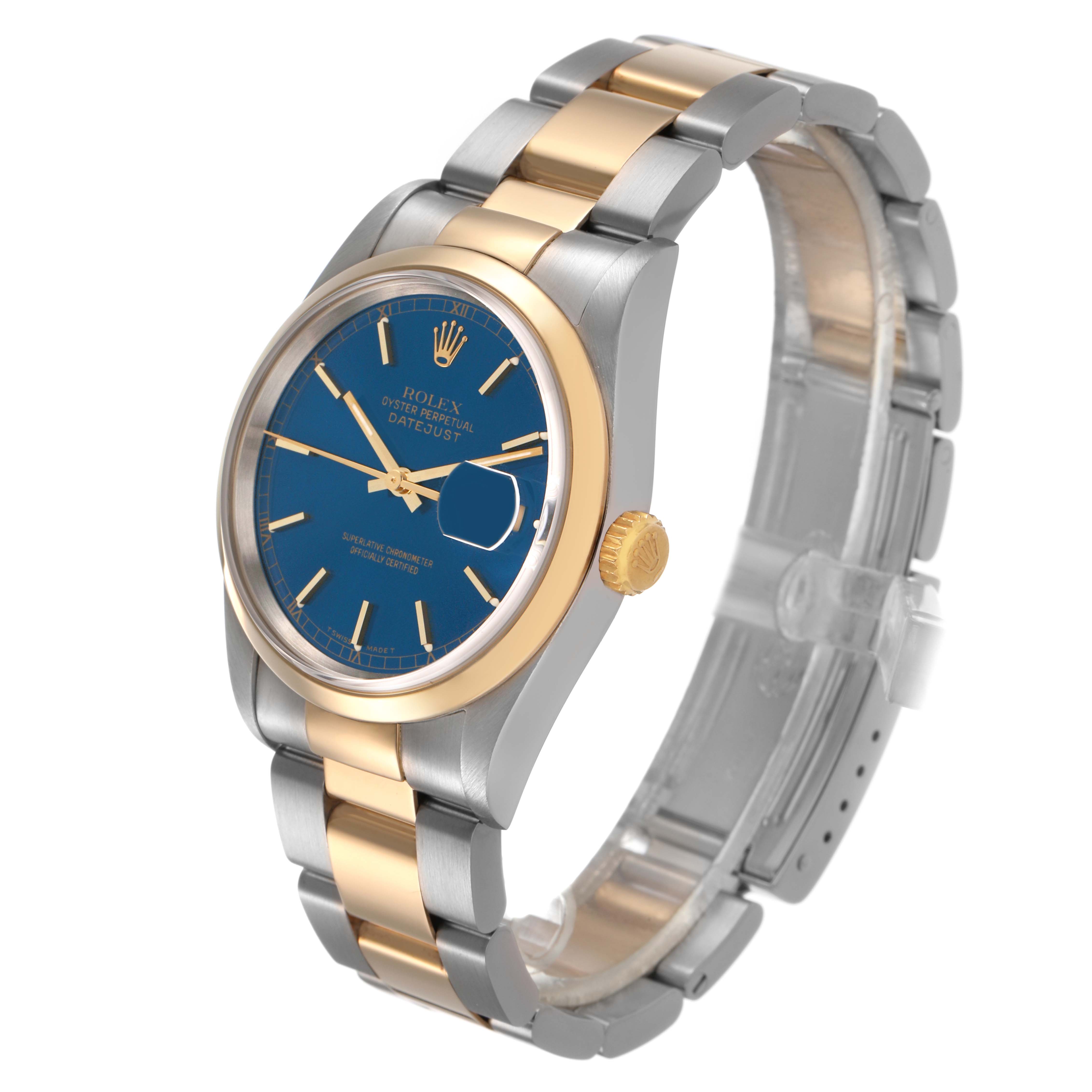 The Rolex Datejust 16203 Men's Steel and Gold (two tone) Blue Dial watch is shown at a three-quarter angle, highlighting the face, bezel, crown, and bracelet.