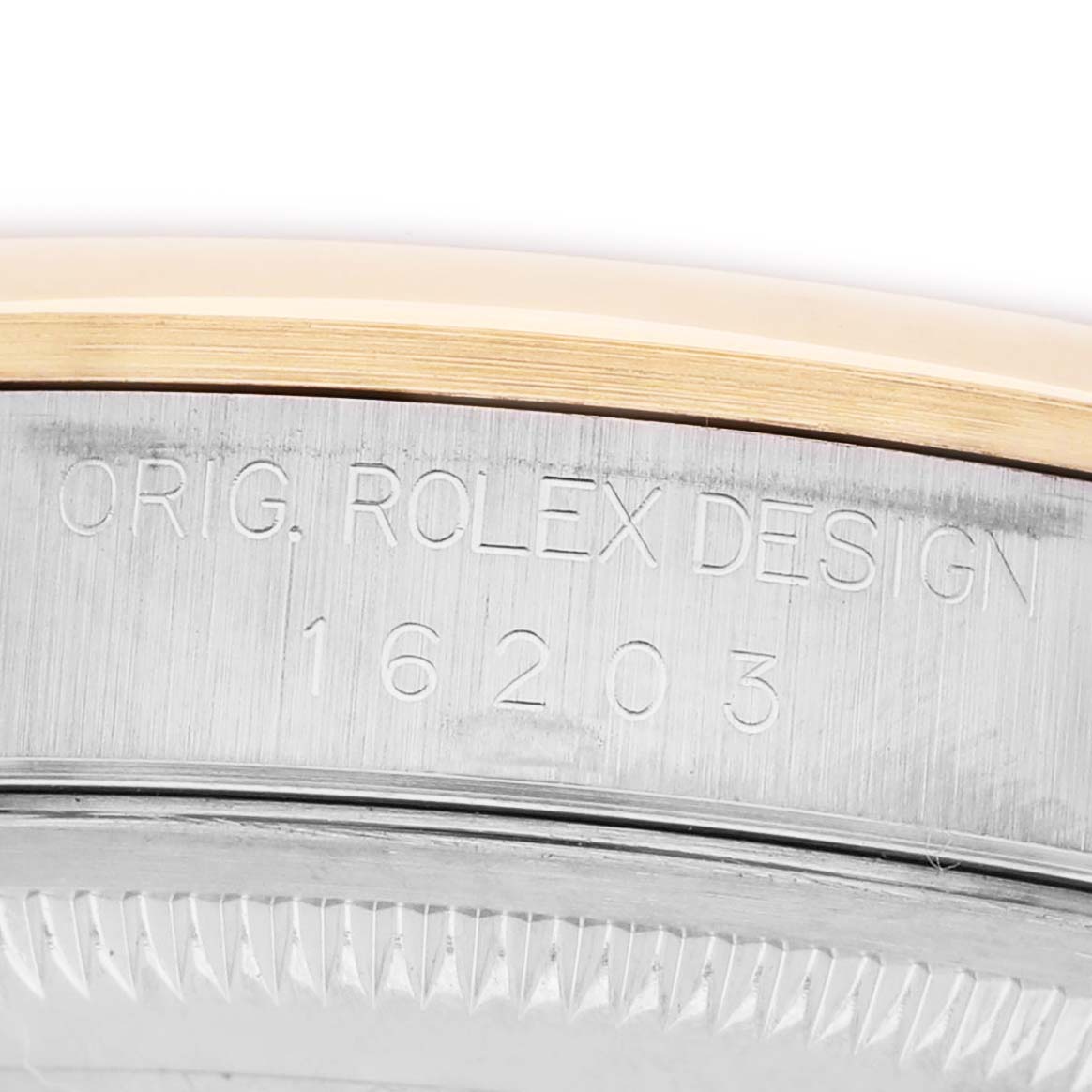 The image shows a close-up of the side engraving on a Rolex Datejust 16203 Men's Steel and Gold (two tone) Blue Dial watch, emphasizing the model number.