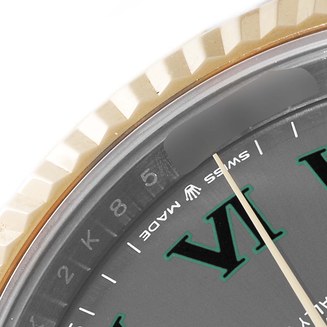 The image shows a close-up of the bezel, part of the dial, and the "Swiss Made" label on a Rolex Datejust 41 126333 Men's Steel and Gold (two tone) Grey Dial 126333 Men's Steel and Gold (two tone) Grey Dial watch.