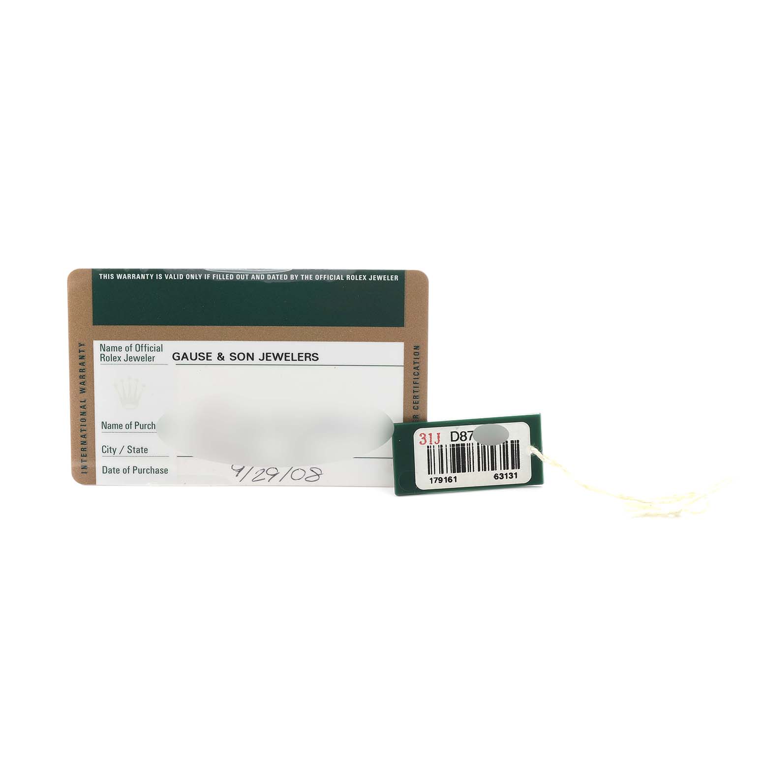 The image shows a Datejust model by Rolex with warranty card and tag at a frontal angle.