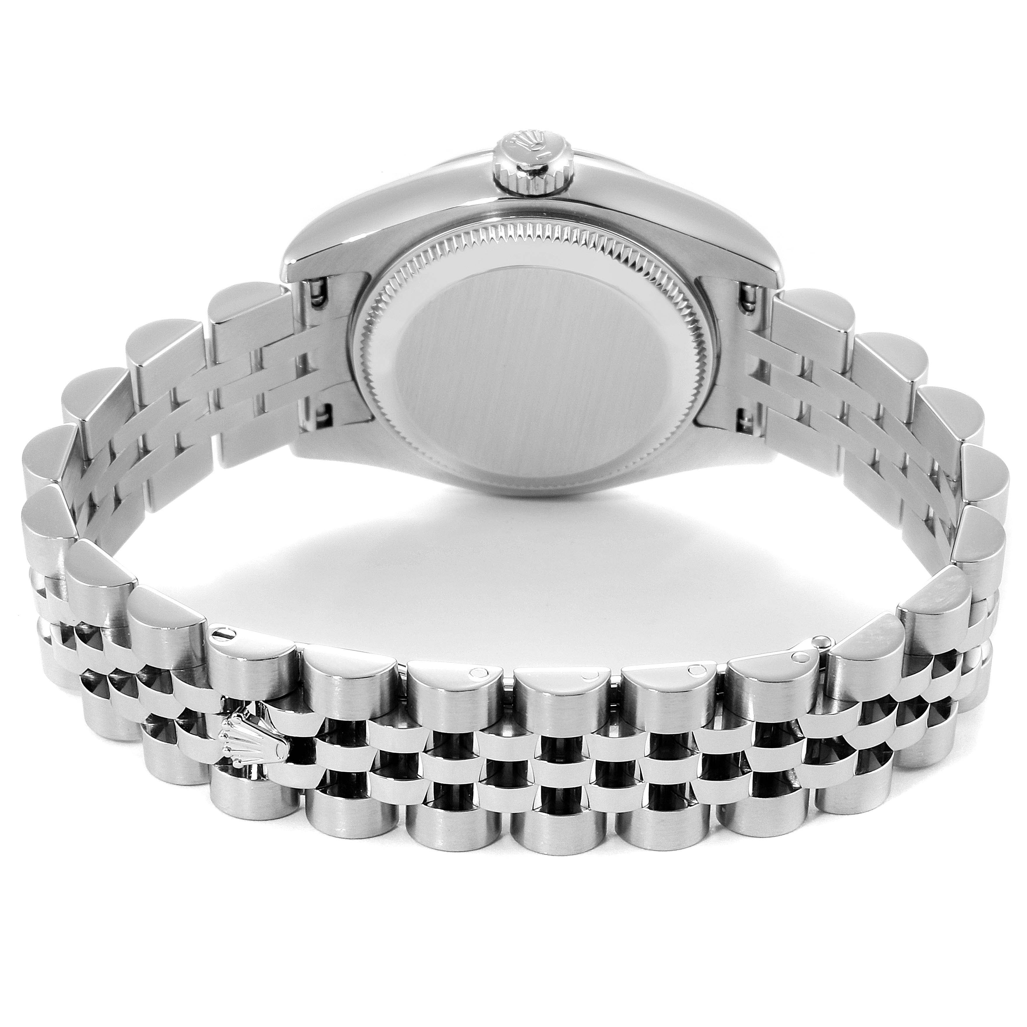 The image shows the back of a Rolex Datejust 179174  Women
s Stainless Steel Silver Dial 179174  Women
s Stainless Steel Silver Dial watch, highlighting its stainless steel case and jubilee bracelet.