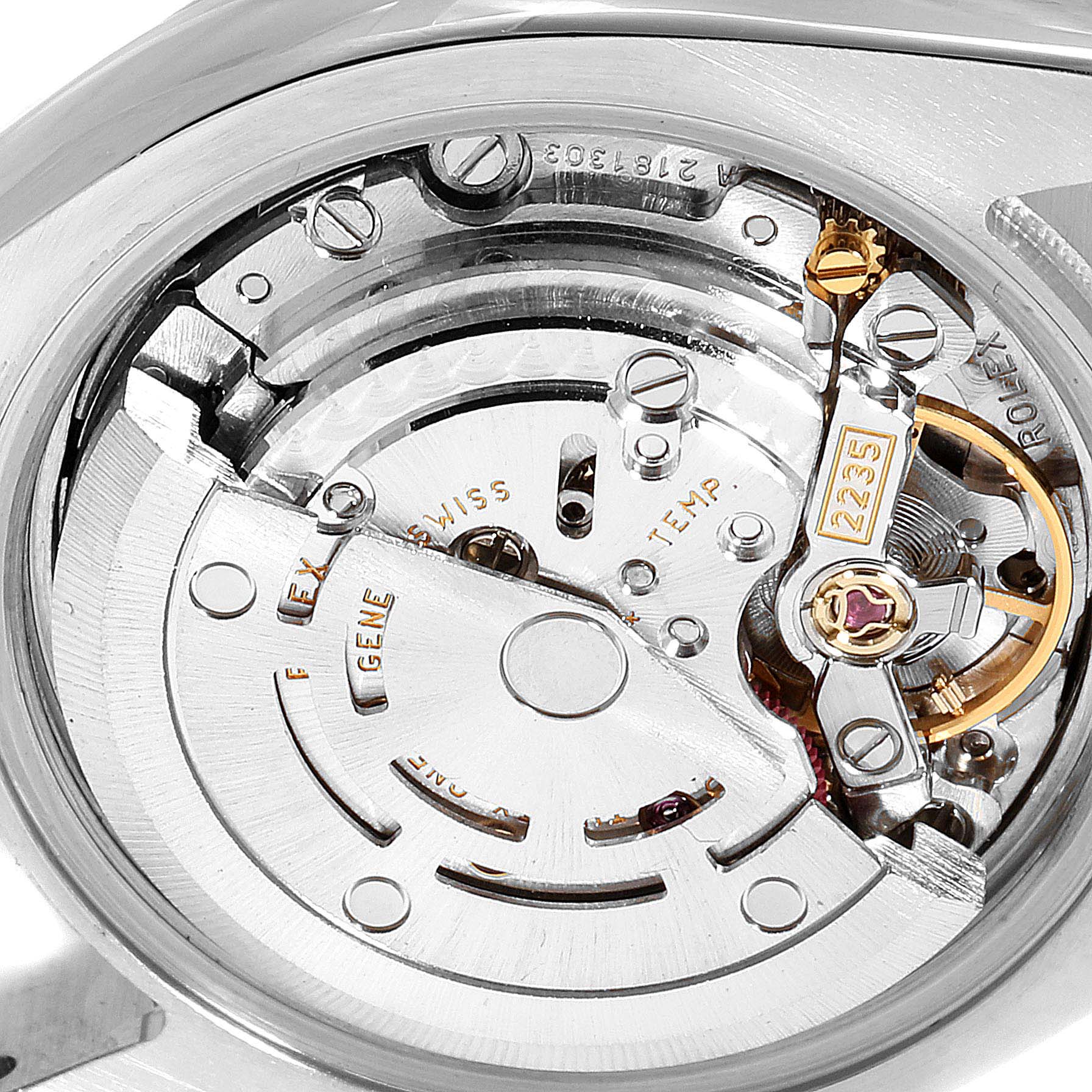 The image shows a close-up view of the movement mechanism of a Rolex Datejust 179174  Women
s Stainless Steel Silver Dial 179174  Women
s Stainless Steel Silver Dial watch.