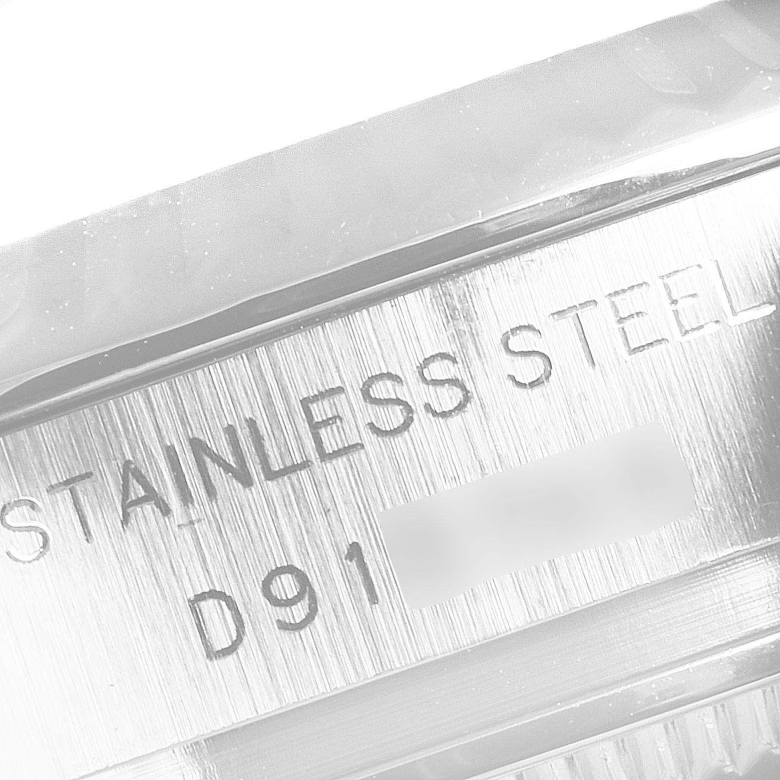 This image shows a close-up of the stainless steel case back of a Rolex Datejust 179174  Women
s Stainless Steel Silver Dial 179174  Women
s Stainless Steel Silver Dial watch, focusing on the engraved text.