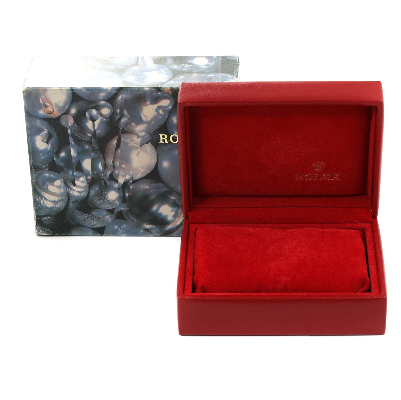 This image shows a graphic cardboard box and an open red velvet case for a Rolex Datejust 79173 Women's Steel and Gold (two tone) Champagne Dial 79173 Women's Steel and Gold (two tone) Champagne Dial watch.